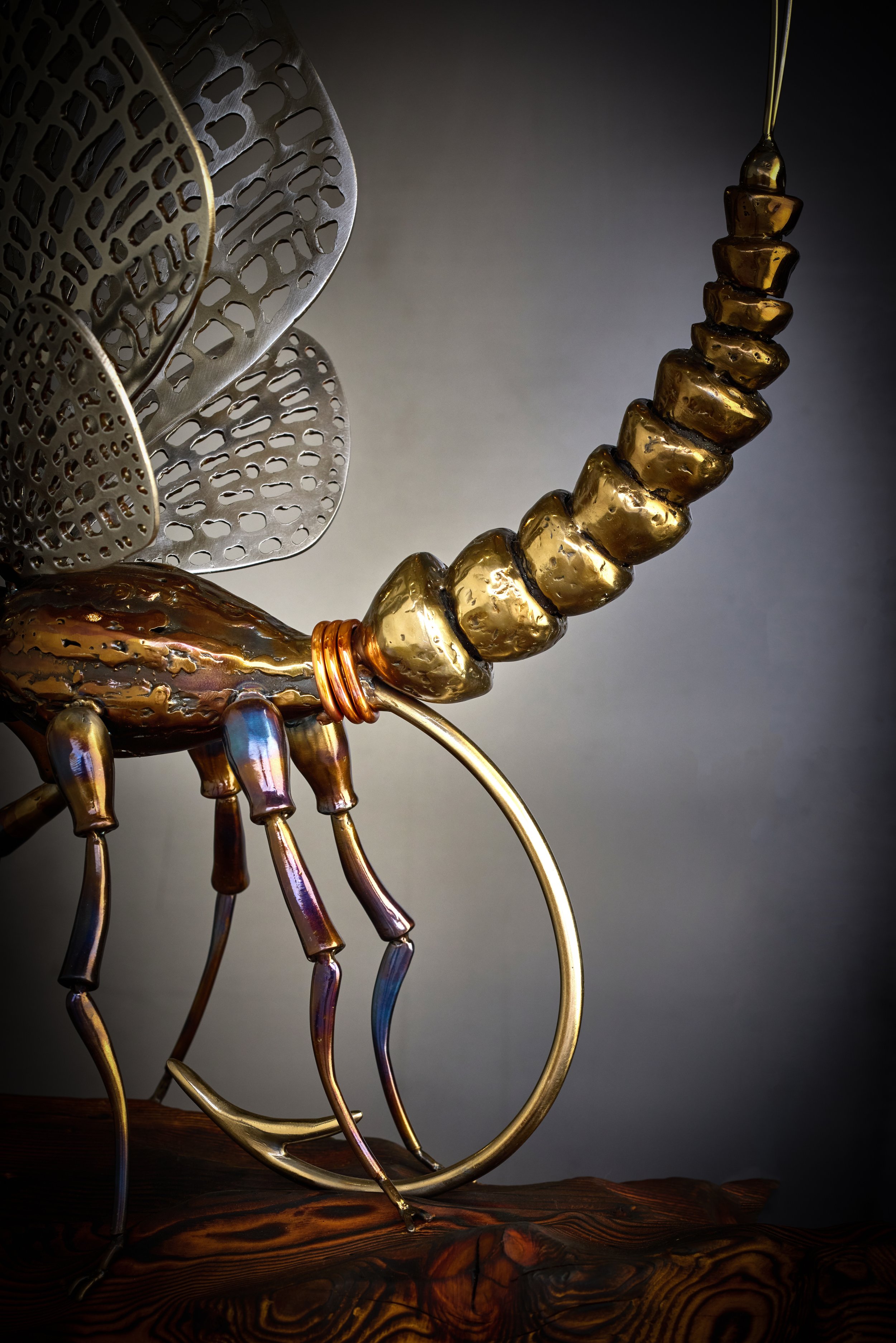 A luxury handcrafted metal sculpture designed for discerning art collectors. Composed of meticulously detailed metals and refined detailing, this heirloom-quality piece captures the elegance of classic fly patterns. 