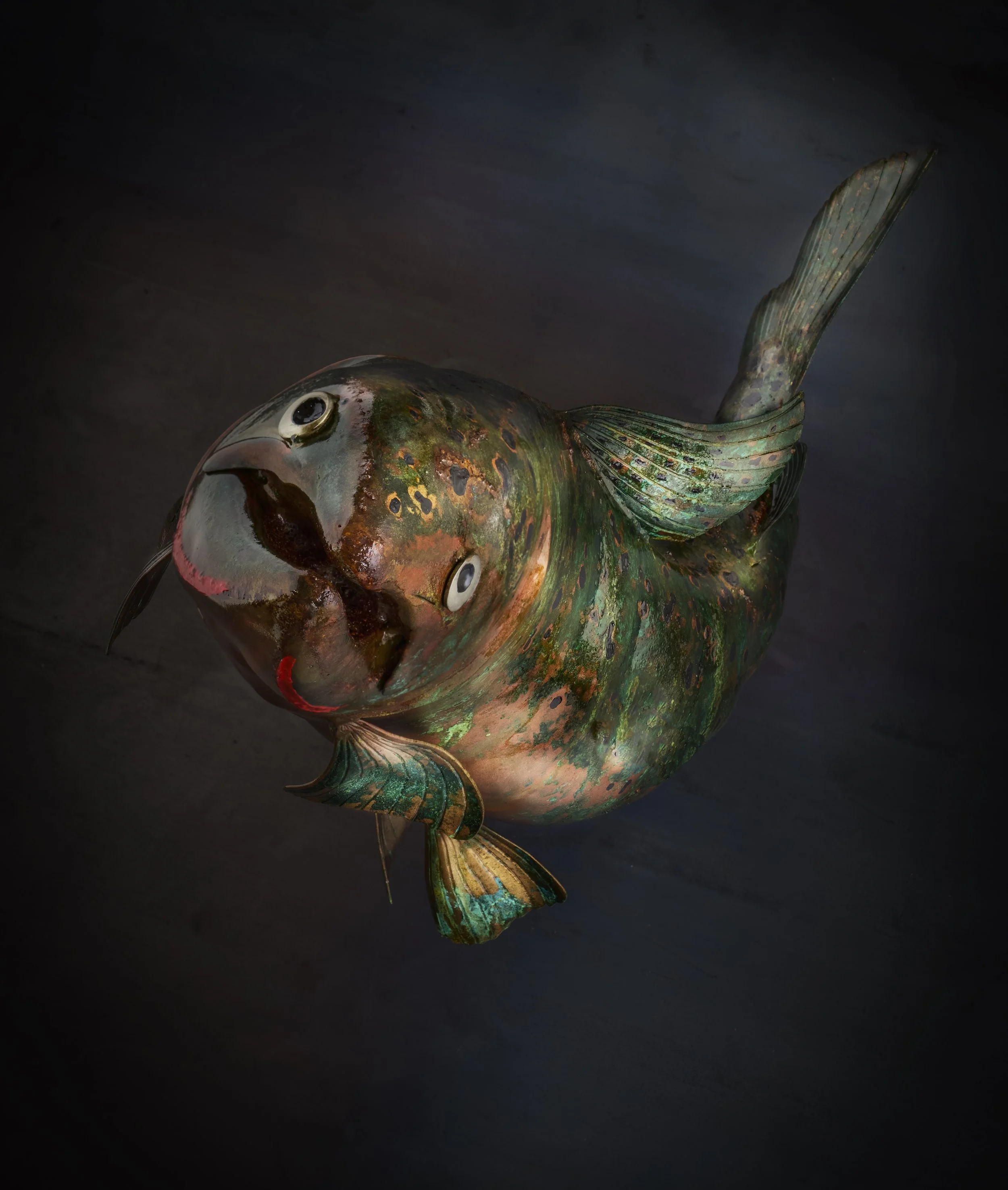 A luxury handcrafted metal sculpture designed for discerning art collectors. Composed of meticulously detailed metals and refined detailing, this heirloom-quality piece captures the elegance of classic fly patterns. 