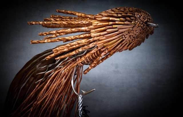 The Zoo Cougar, A luxury handcrafted metal sculpture designed for discerning art collectors. Composed of meticulously detailed metals and refined detailing, this heirloom-quality piece captures the elegance of classic fly patterns. 