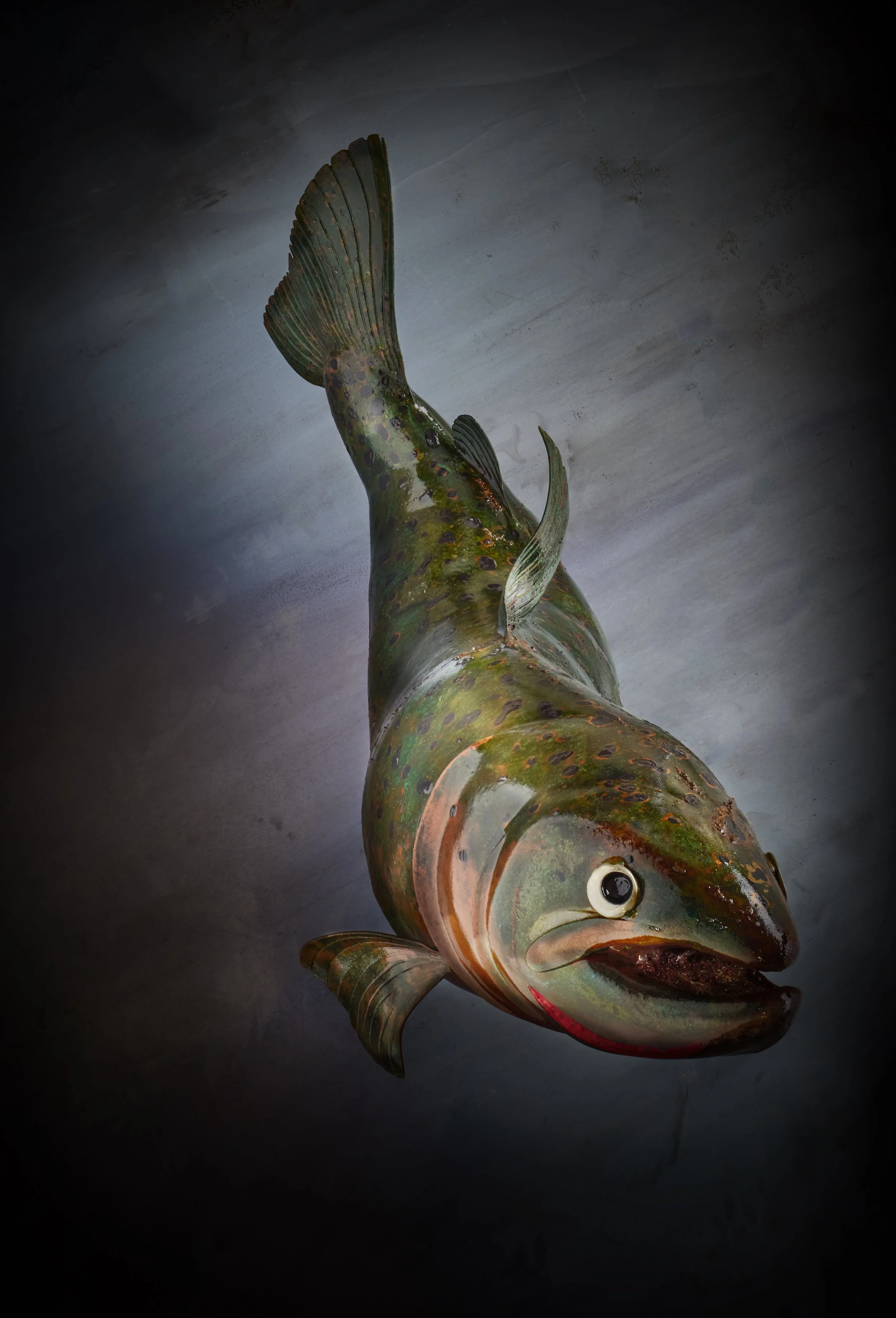 The Copper Cutthroat, a luxury handcrafted metal sculpture designed for discerning art collectors. Composed of meticulously detailed metals and refined detailing, this heirloom-quality piece captures the elegance of classic fly patterns. 