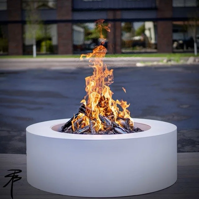 Luxury Logs burning in a high end, premium fire pit.
