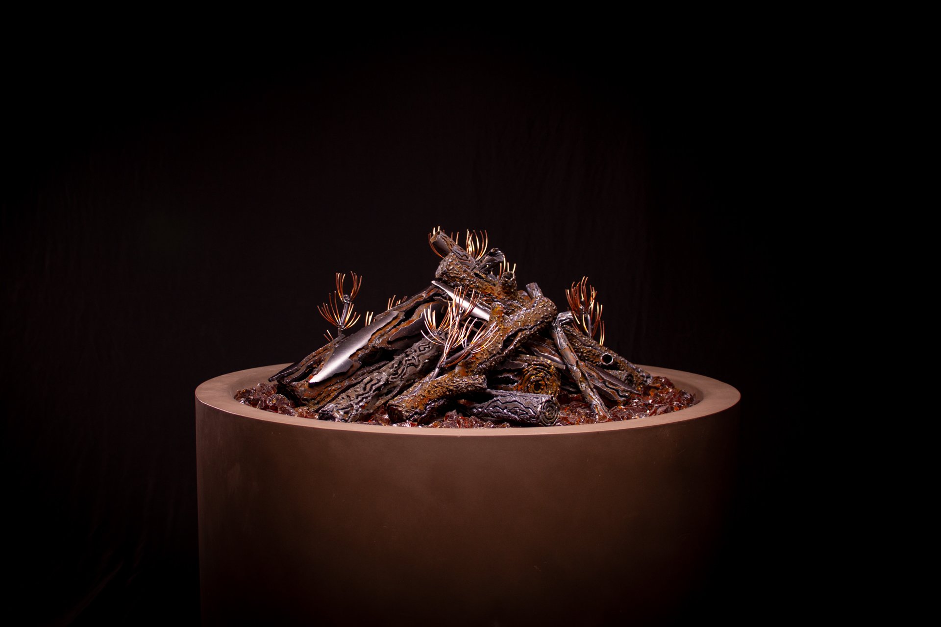 The Montana variety, a perfect mix of stylized steel logs designed for any gas fire pit.