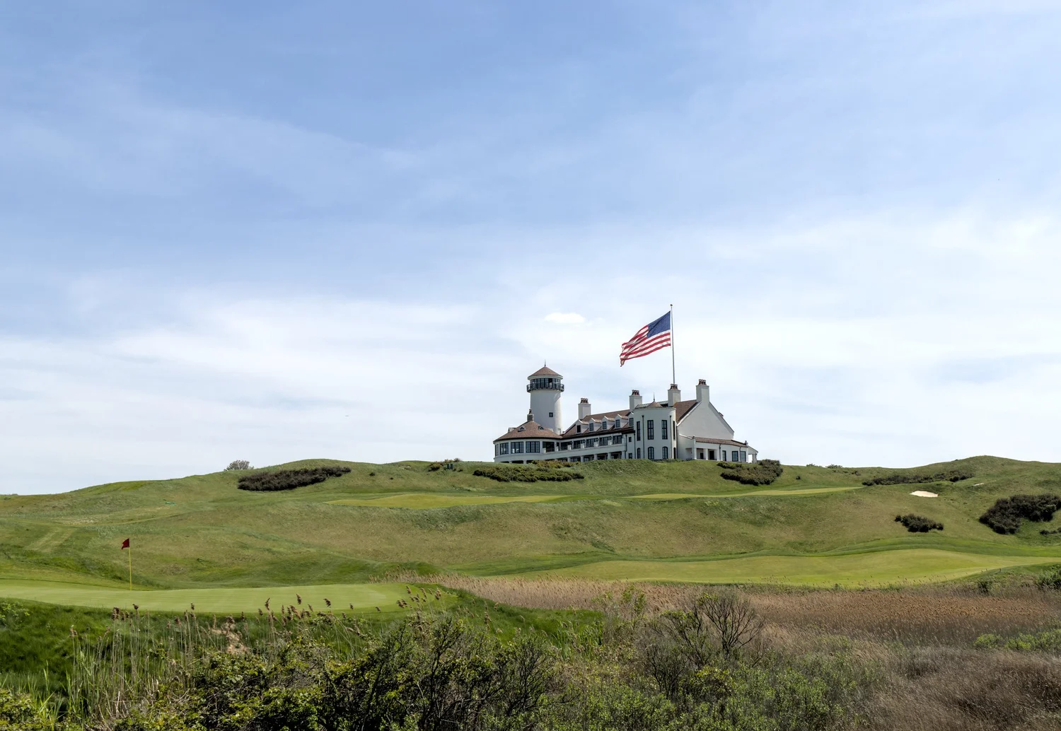 Coastal golf course and lighthouse