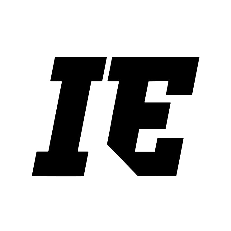 A black and white logo with bold, stylized letters 'TC' outlined in white.