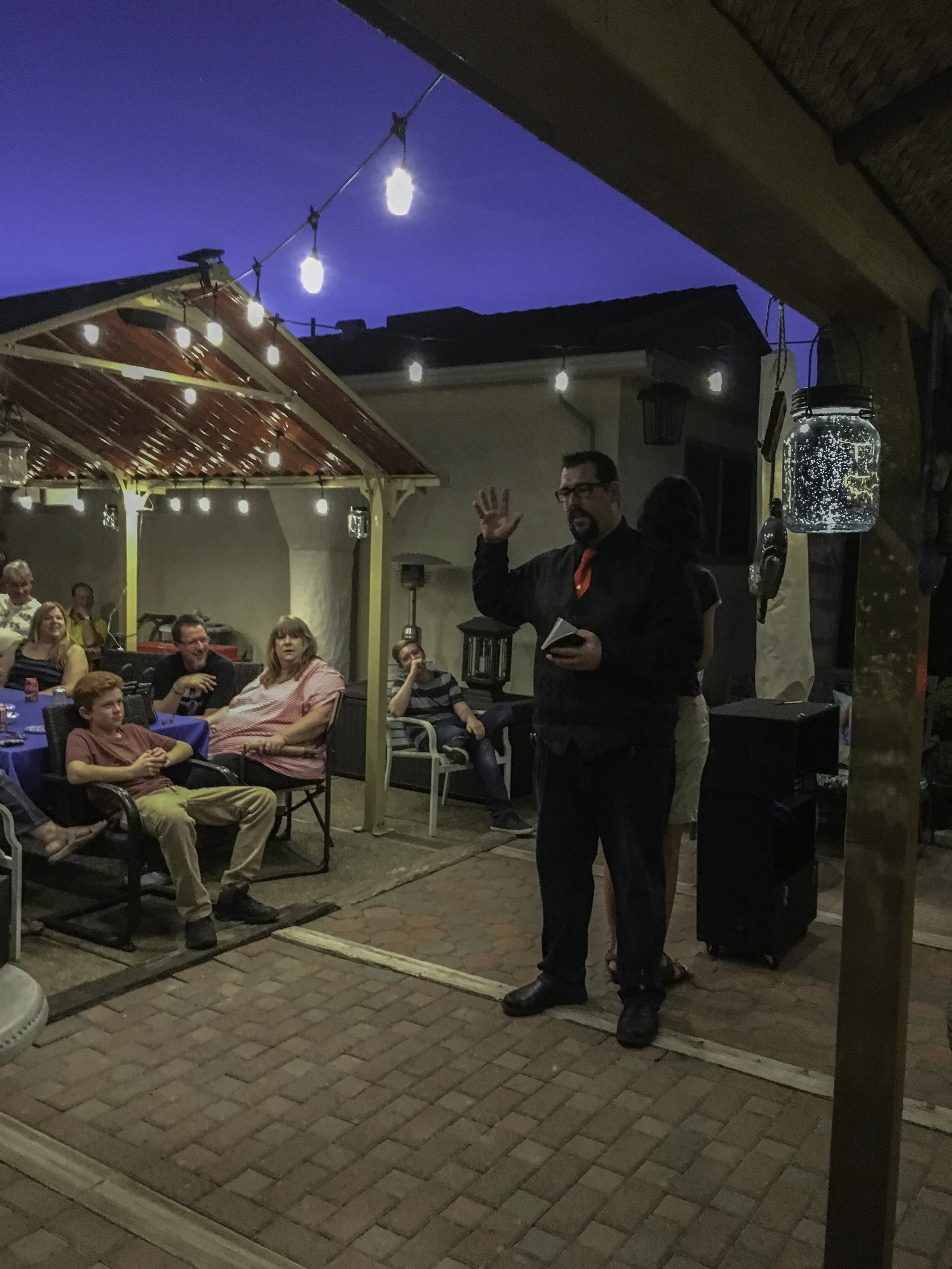 Kyle Elder performing a stand-up magic show