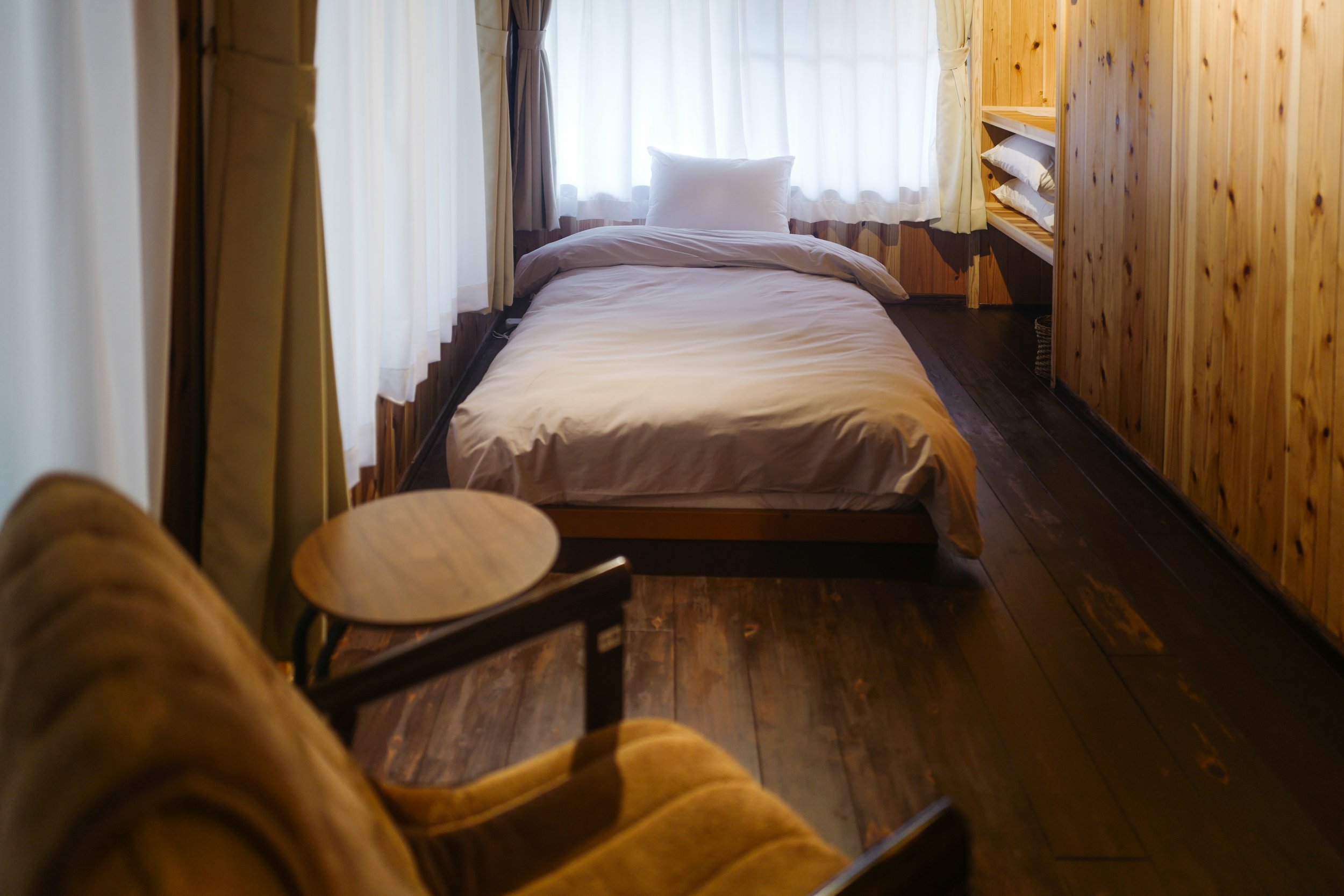 The other bed in the inner room.