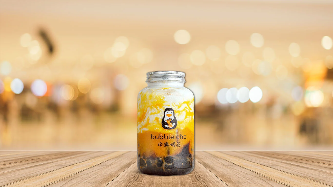 Bubble Cha mango on brown table.jpg