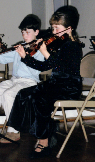 Kathleen Gallagher-McLellan as a Suzuki violin student.