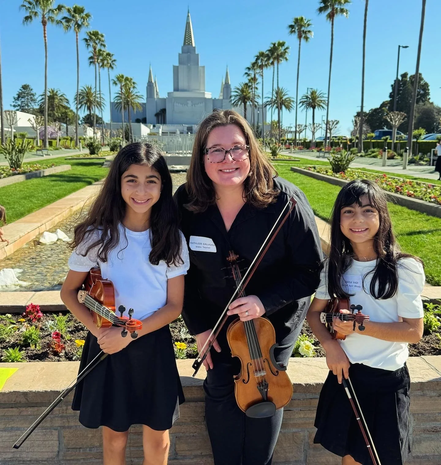 Suzuki Association of Northern California play in with Suzuki Violin School Volume 1 students