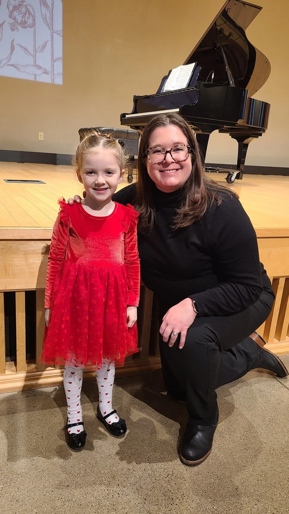 Suzuki Violin School Volume 1 student enjoying The Culture House's Strings & Songs workshop, masterclass, and recital