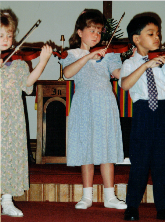 Kathleen Gallagher-McLellan as a Suzuki violin student.