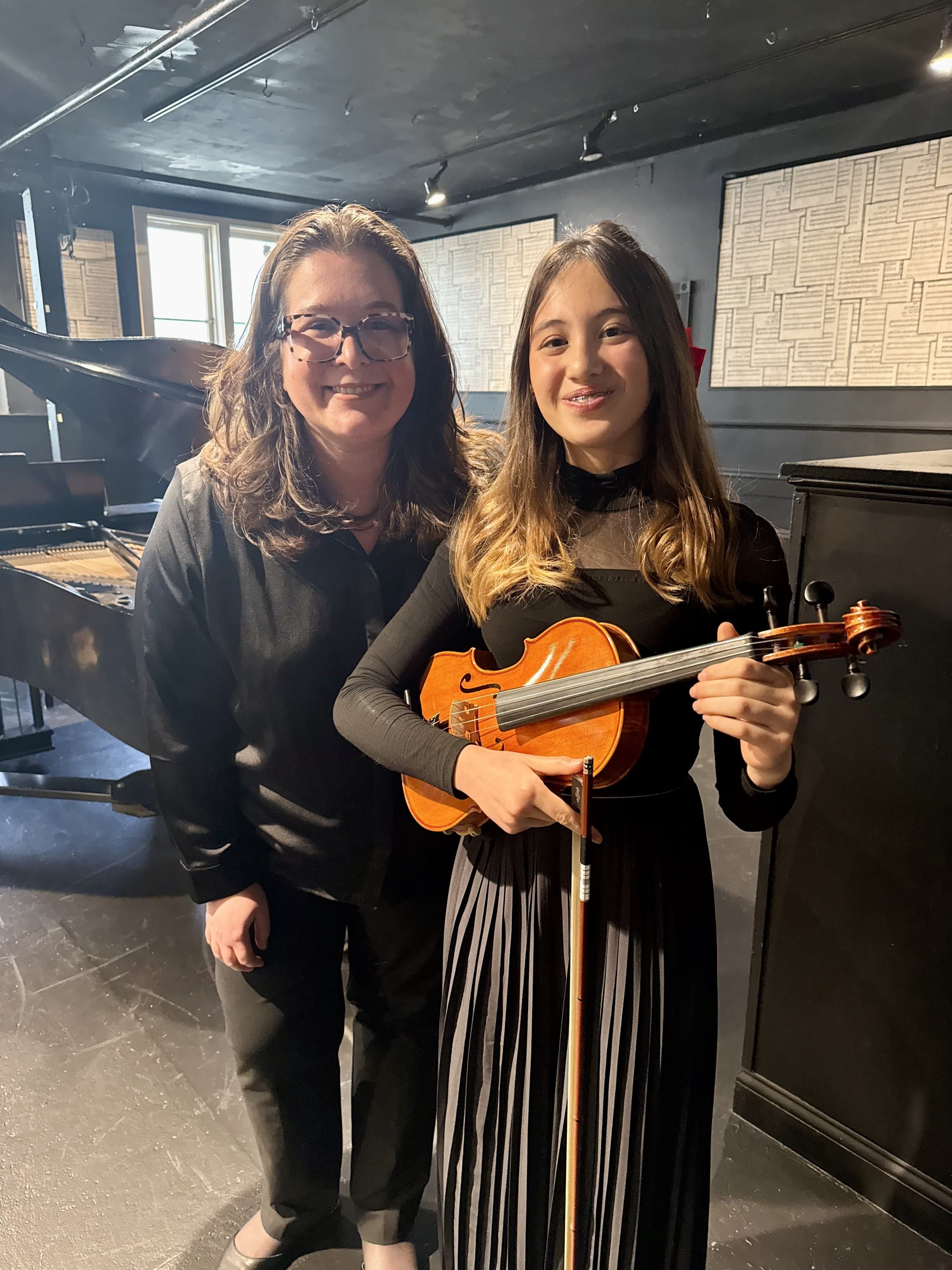 Suzuki Violin School Volume 4 student post solo recital at the William J. Geery Theater in Sacramento