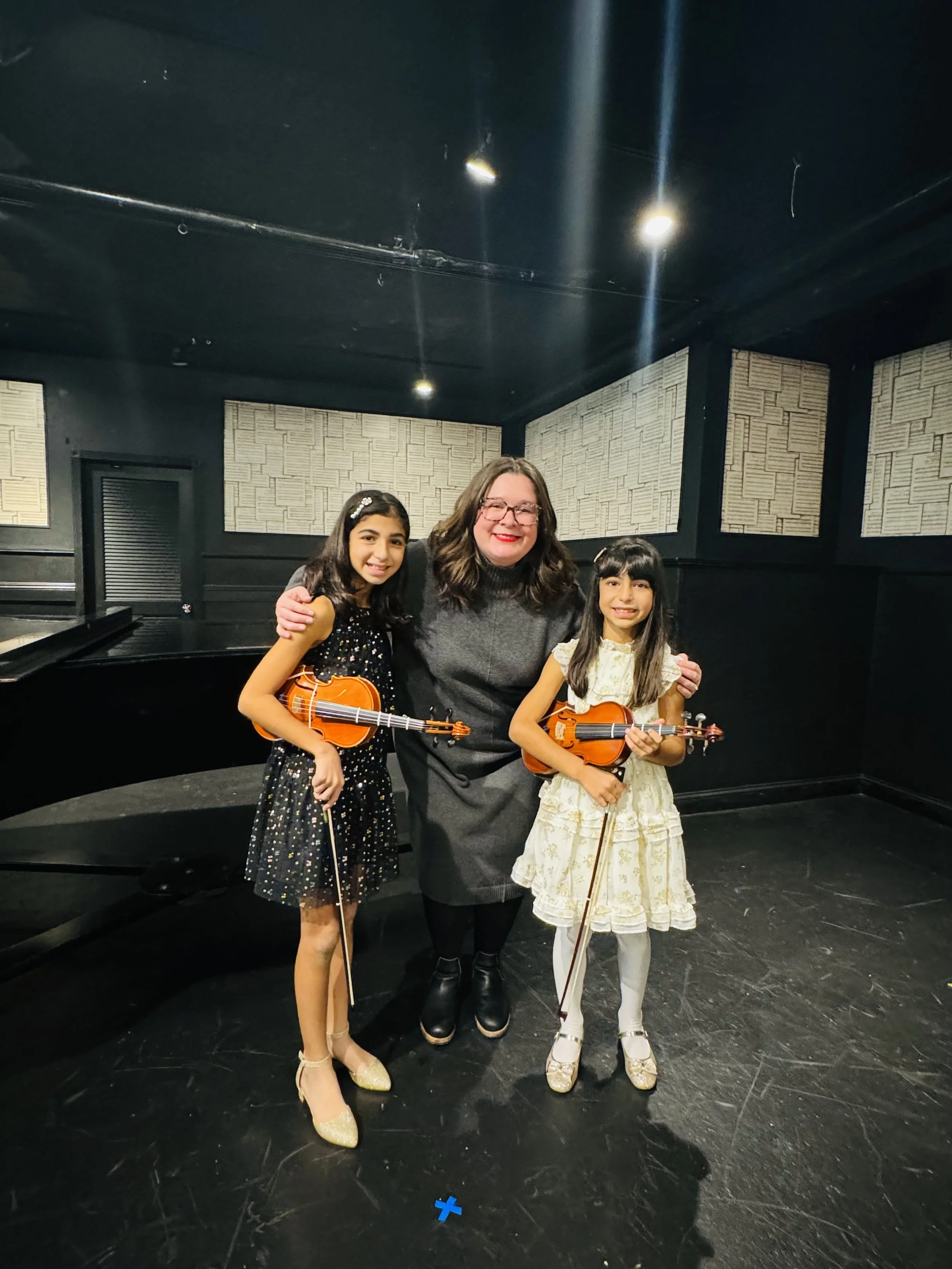 Suzuki Violin School Volume 1 and 2 students post solo recital at the William J. Geery Theater in Sacramento