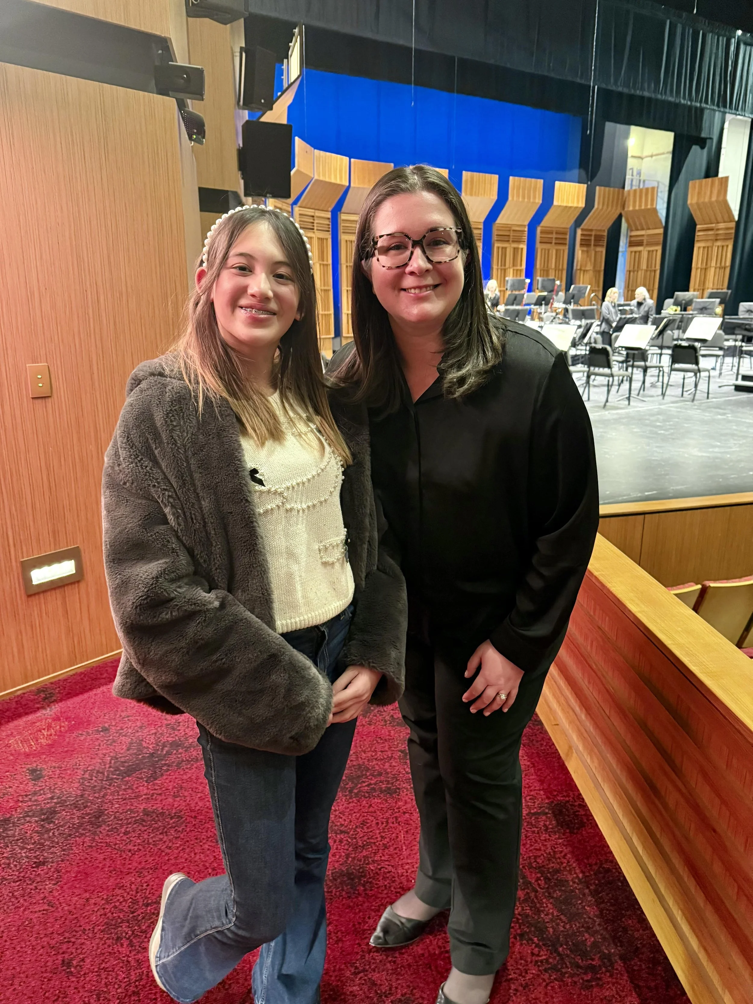 Suzuki Violin School Volume 4 student during intermission at the Sacramento Philharmonic and Opera performance