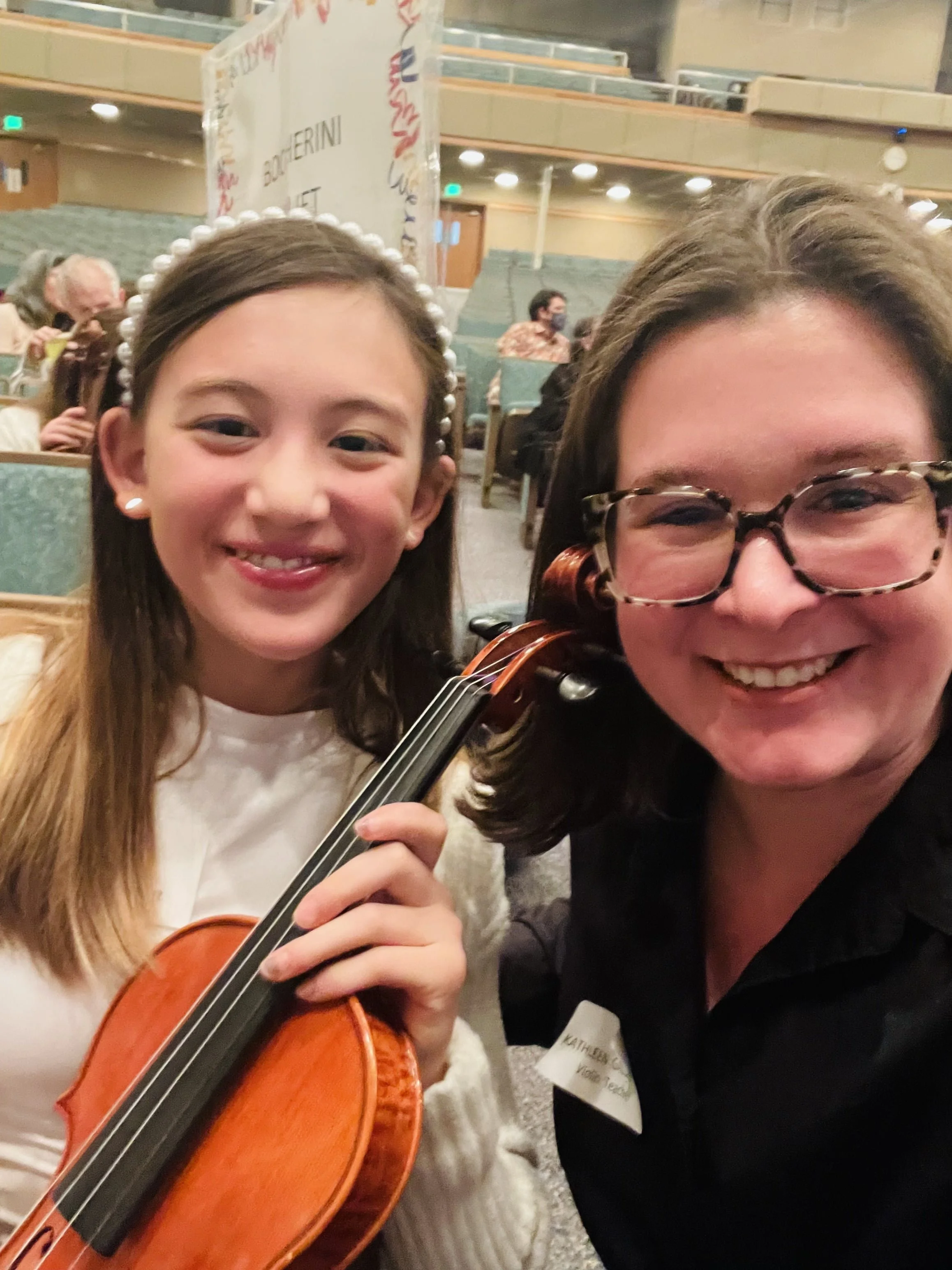 Suzuki Association of Northern California play in with Suzuki Violin School Volume 3 student