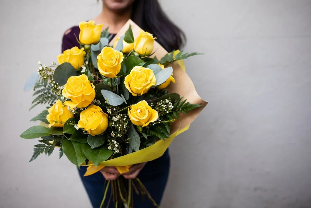 Valentine's Day Special- A handheld bouquet of 12 roses and 12 chocolates