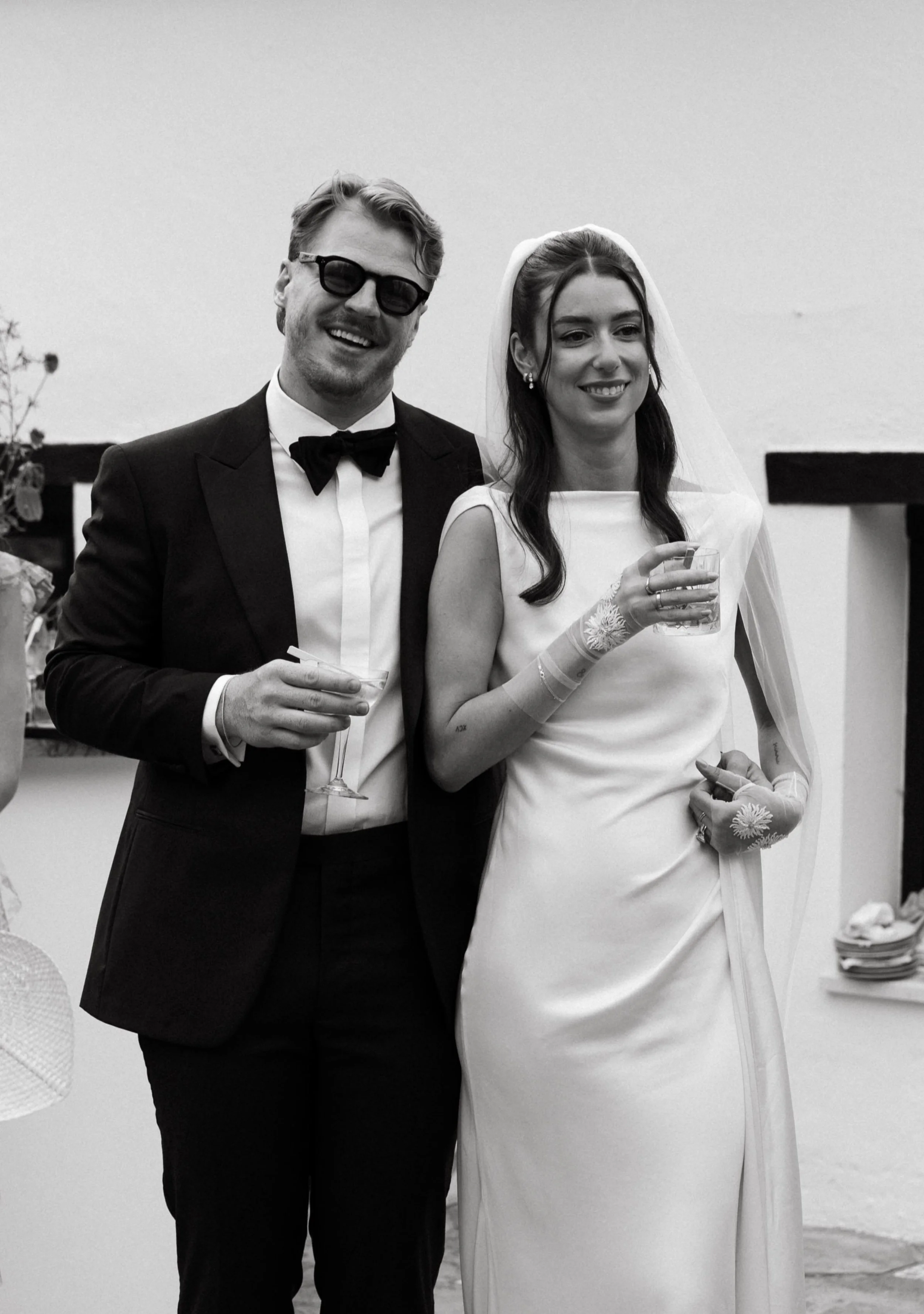 Documentary wedding photography capturing natural cocktail moments of bride and groom in Sotogrande