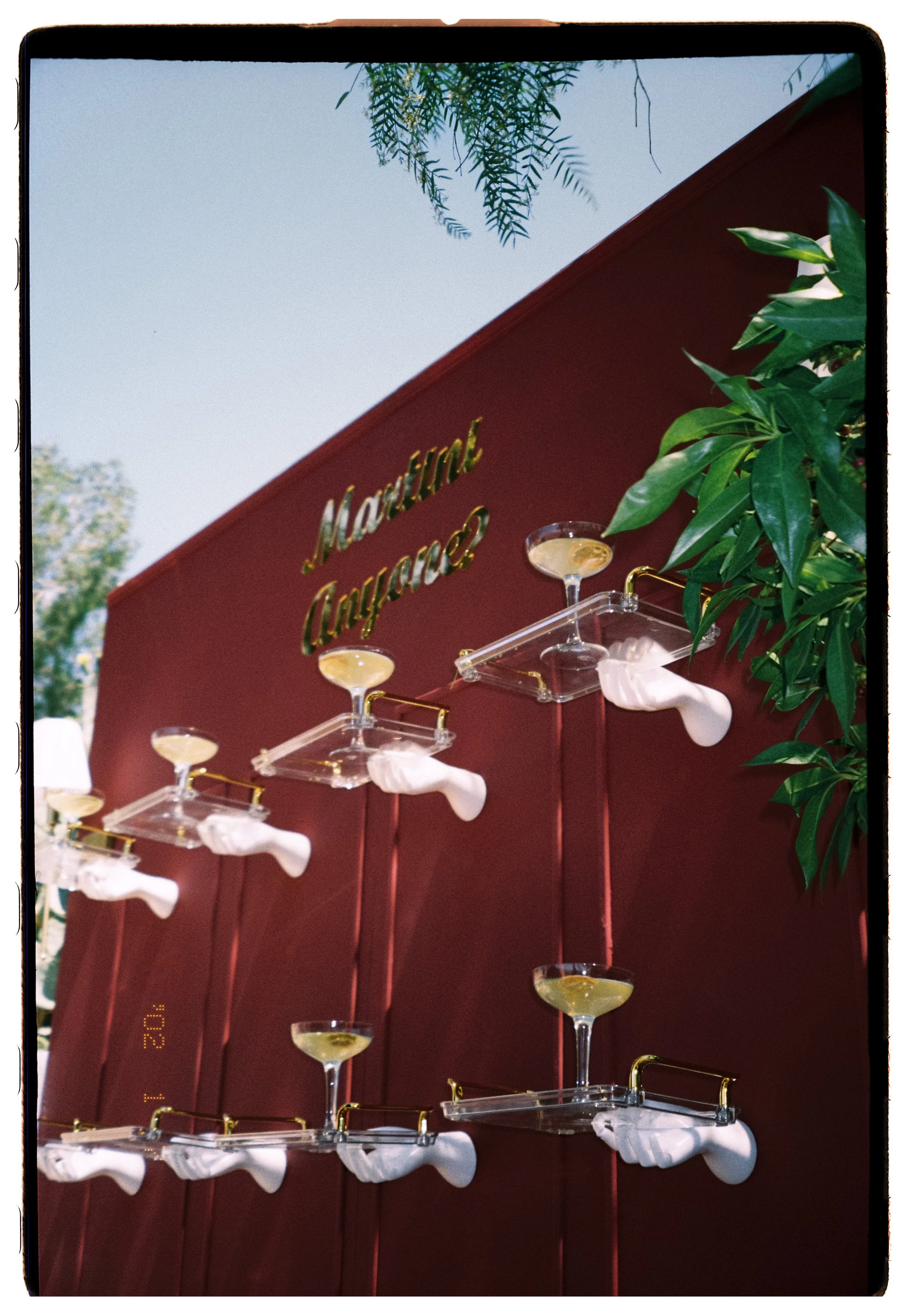 Dramatic purple Martini wall at a destination wedding