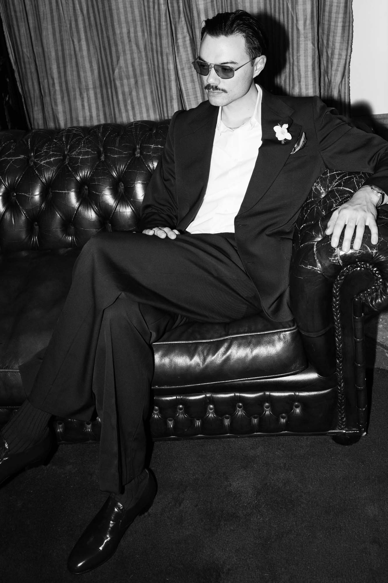 Modern groom style at a destination wedding in Spain with subtle vintage inspired details wedding