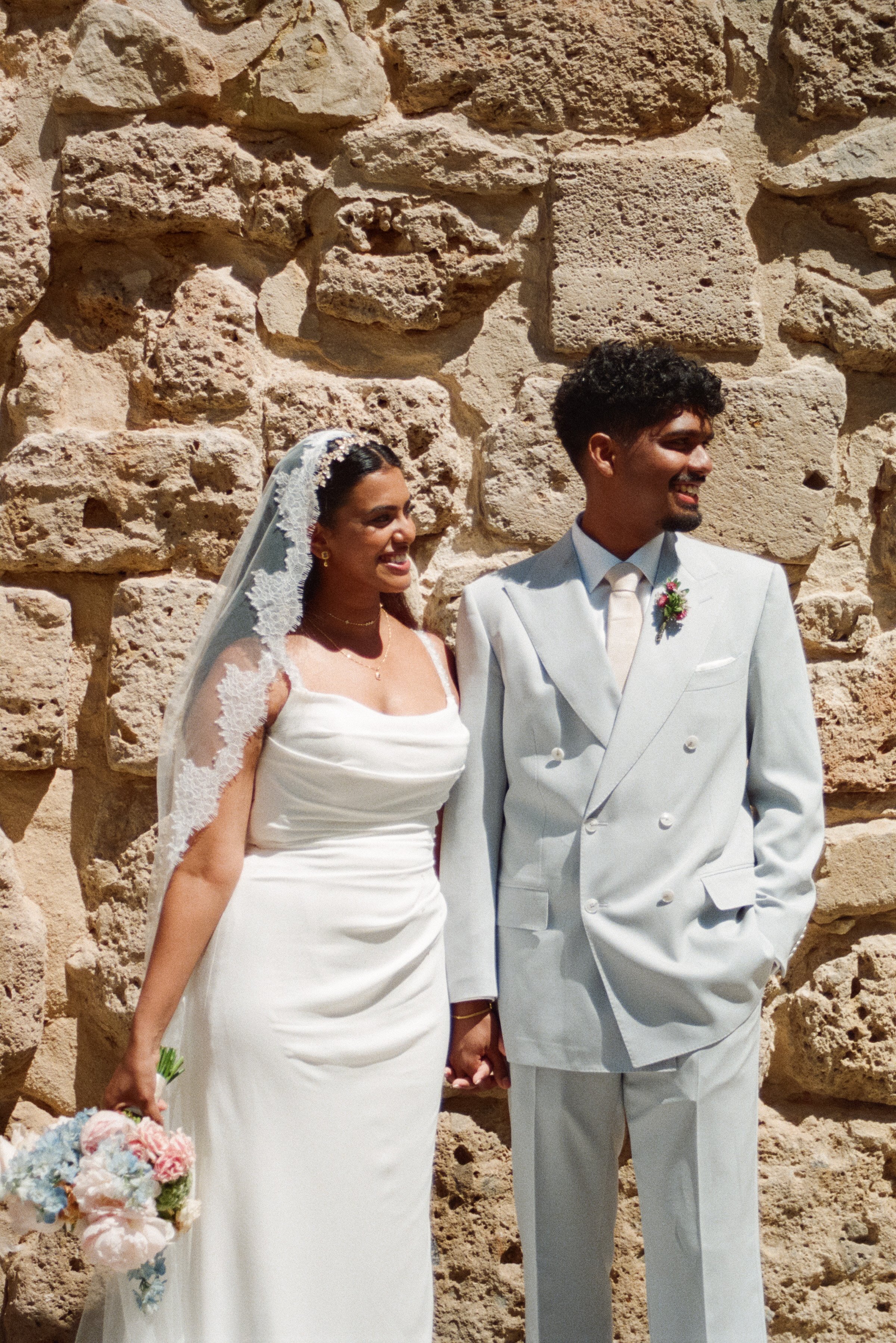 Couple walking through the streets of Florence during their wedding portraits on film