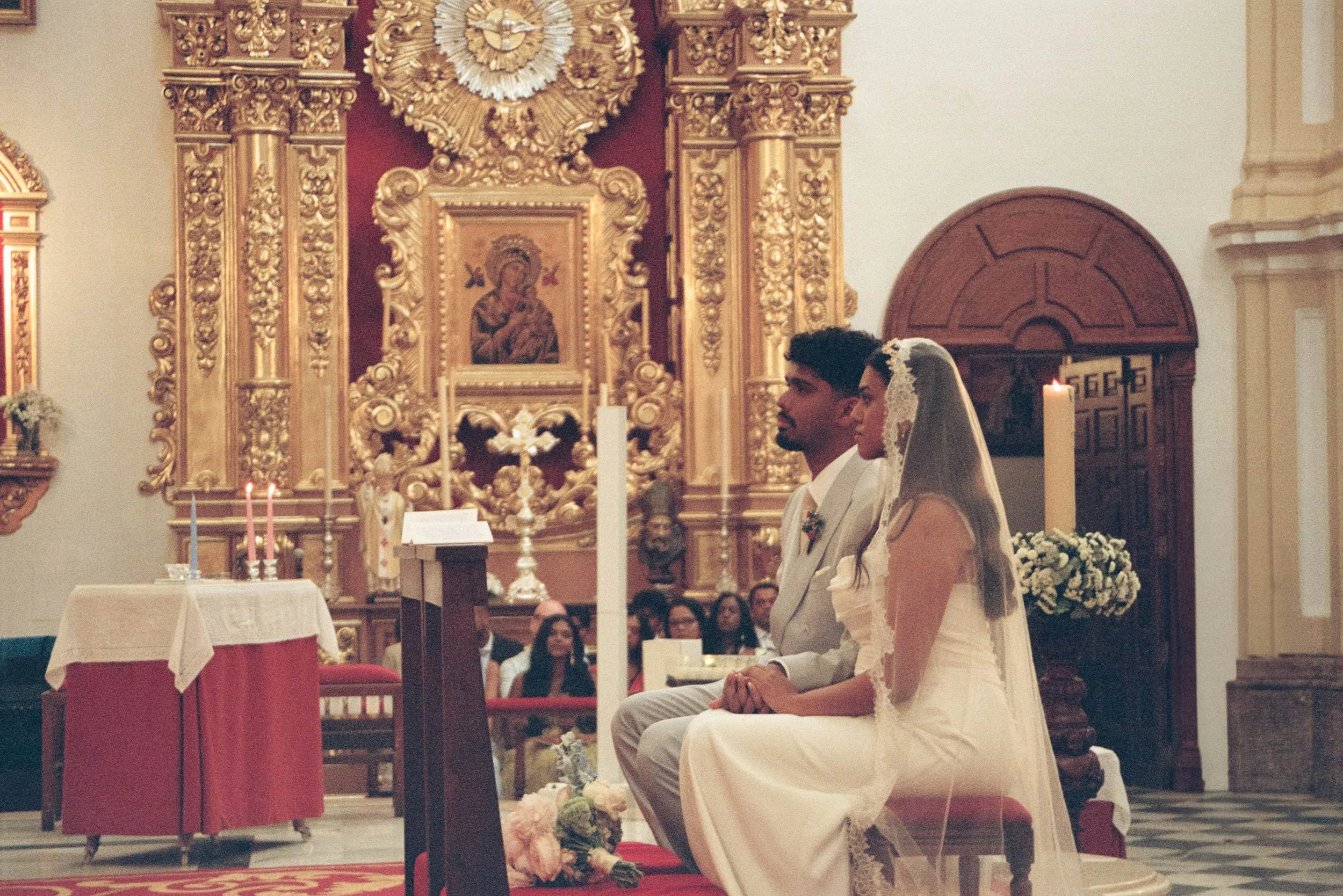 Soft grainy wedding portraits captured on film in Marbella in a church