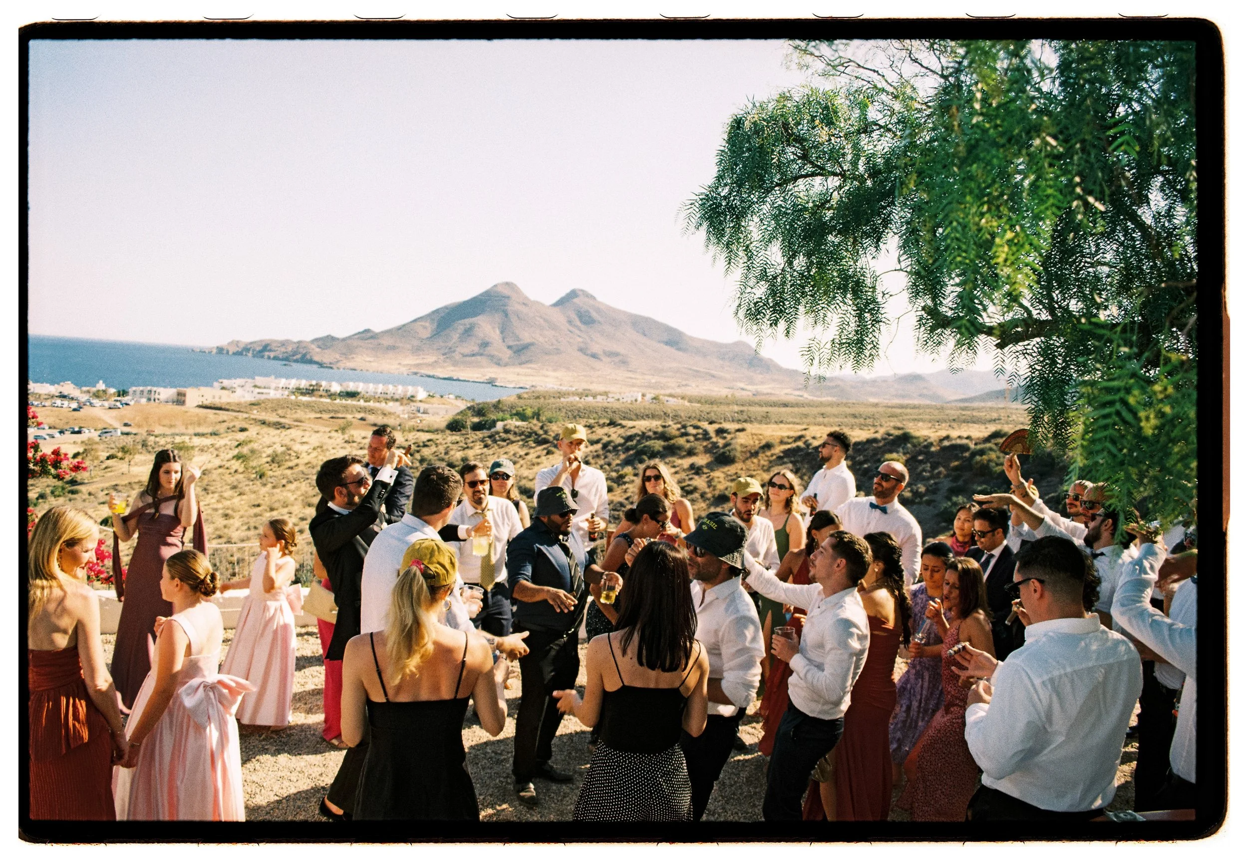 Outdoor wedding dance floor with mountains and sea in Spain