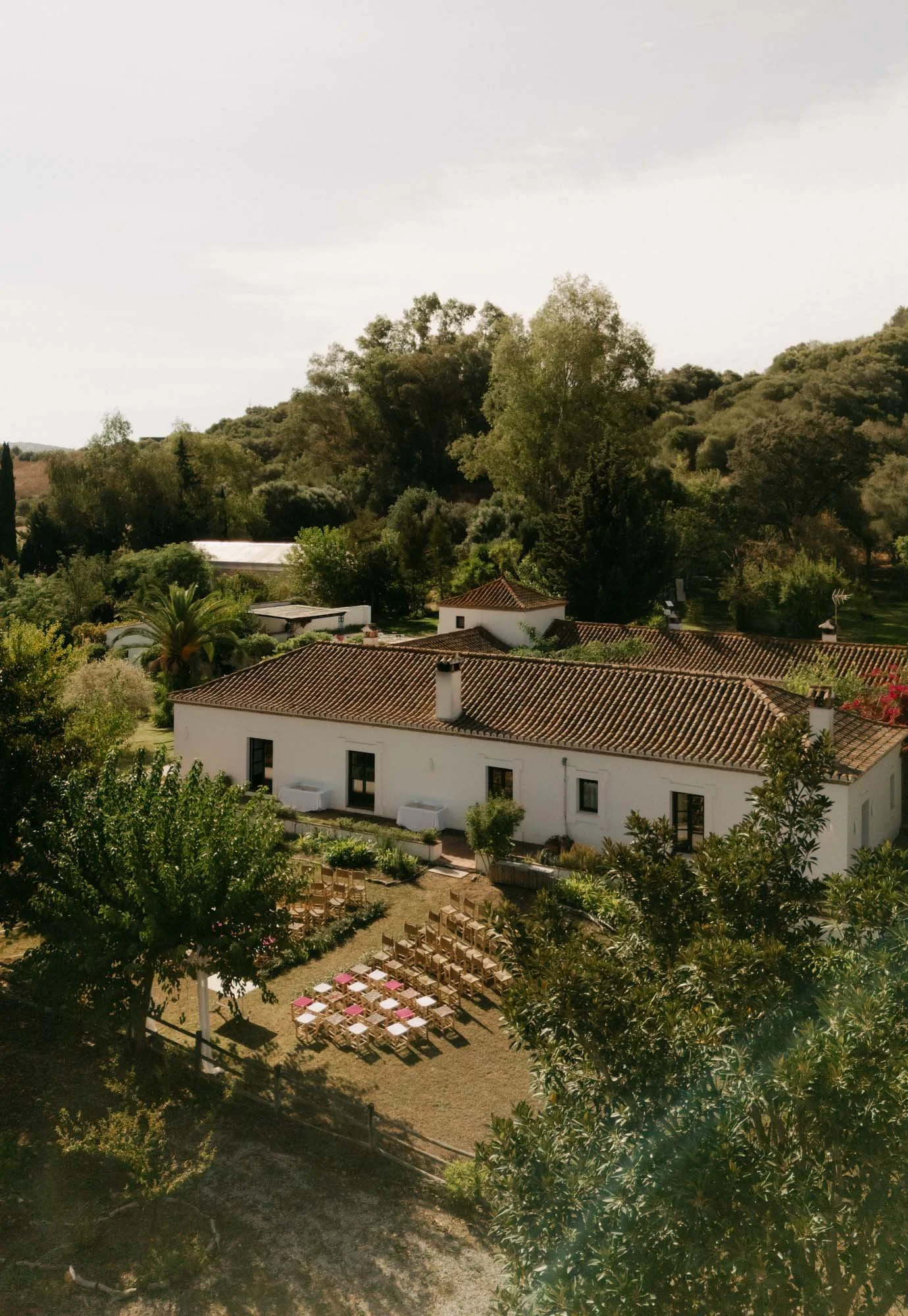 Outdoor wedding ceremony in Andalusia surrounded by nature and warm southern light drone wedding photography