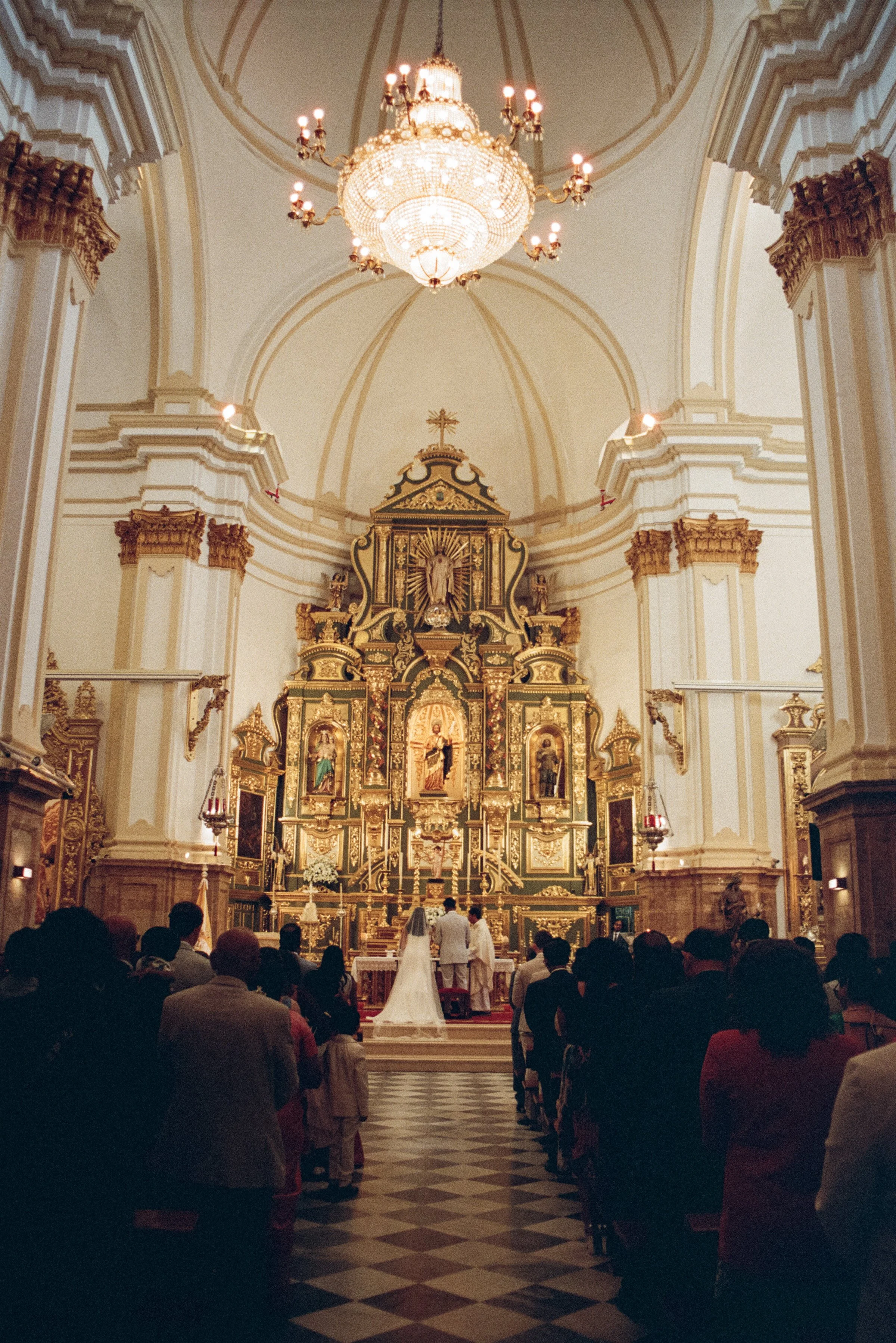 Soft grainy wedding portraits captured on film in Marbella in a church