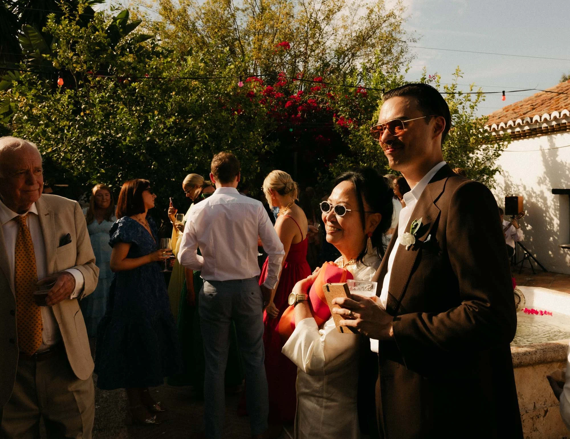 Destination wedding photographer in Spain capturing natural and in the moment cocktail hour scenes