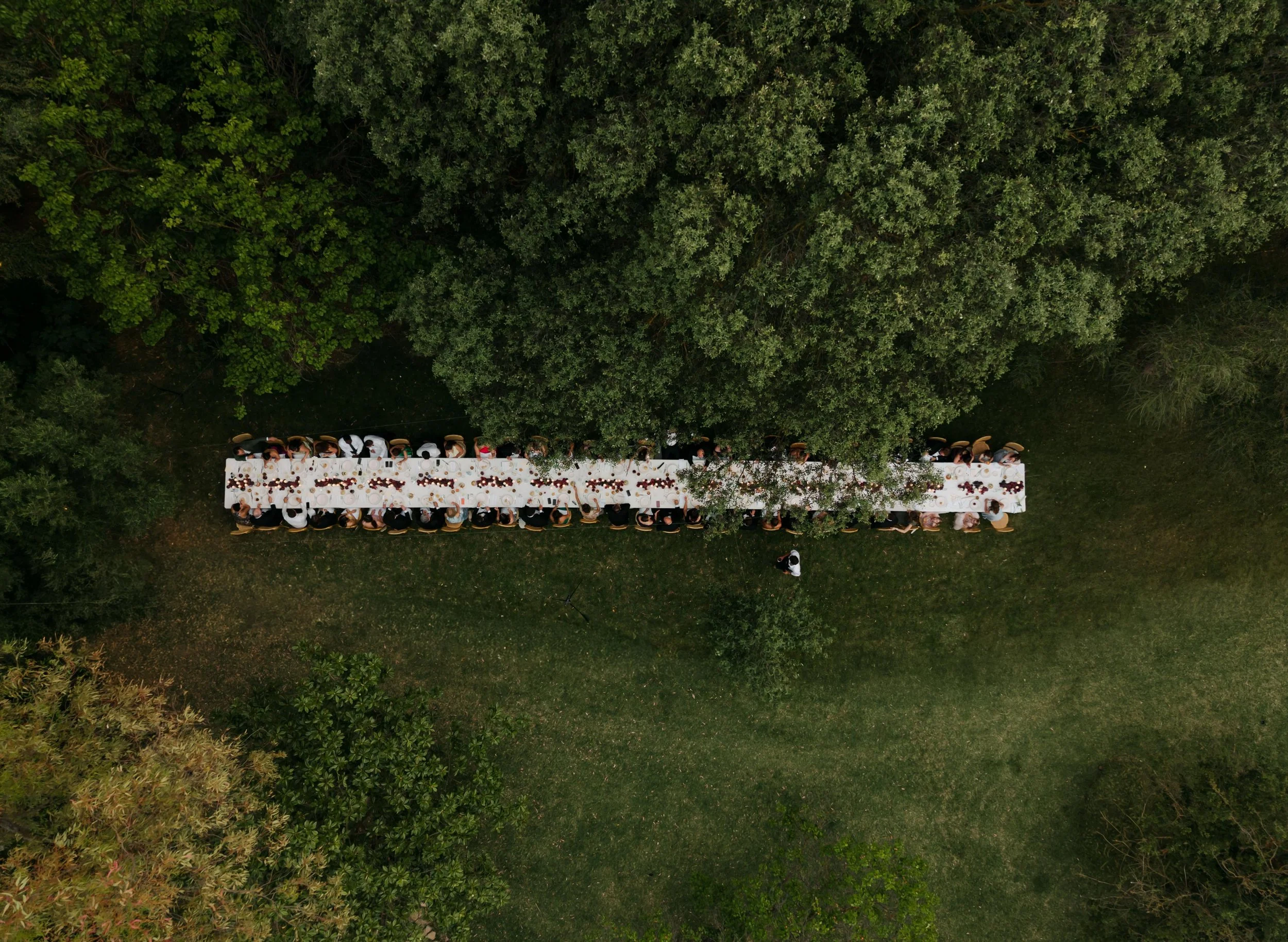 Aerial drone view of an outdoor wedding reception in Spain