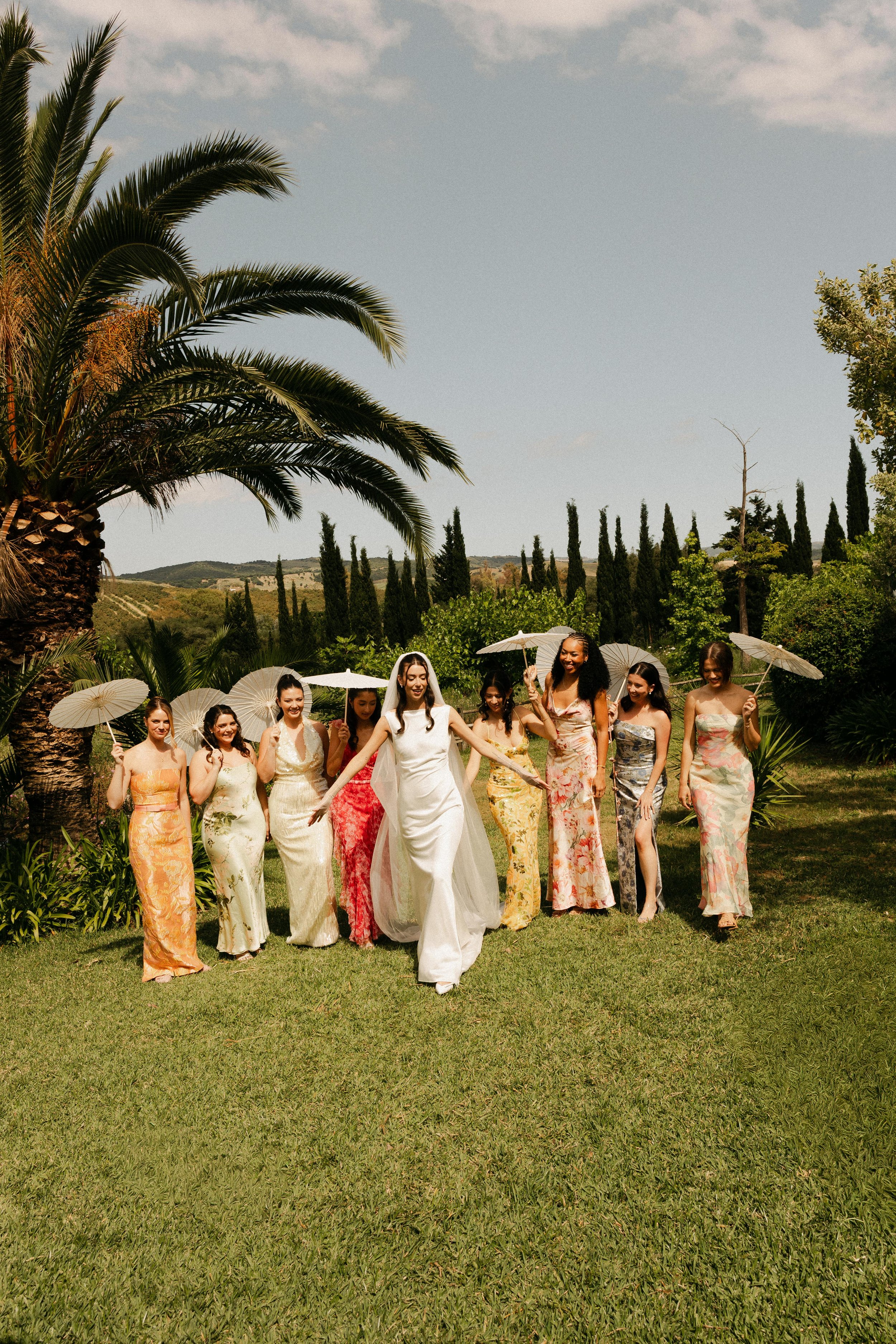 Bride sharing a joyful moment with her bridesmaids
