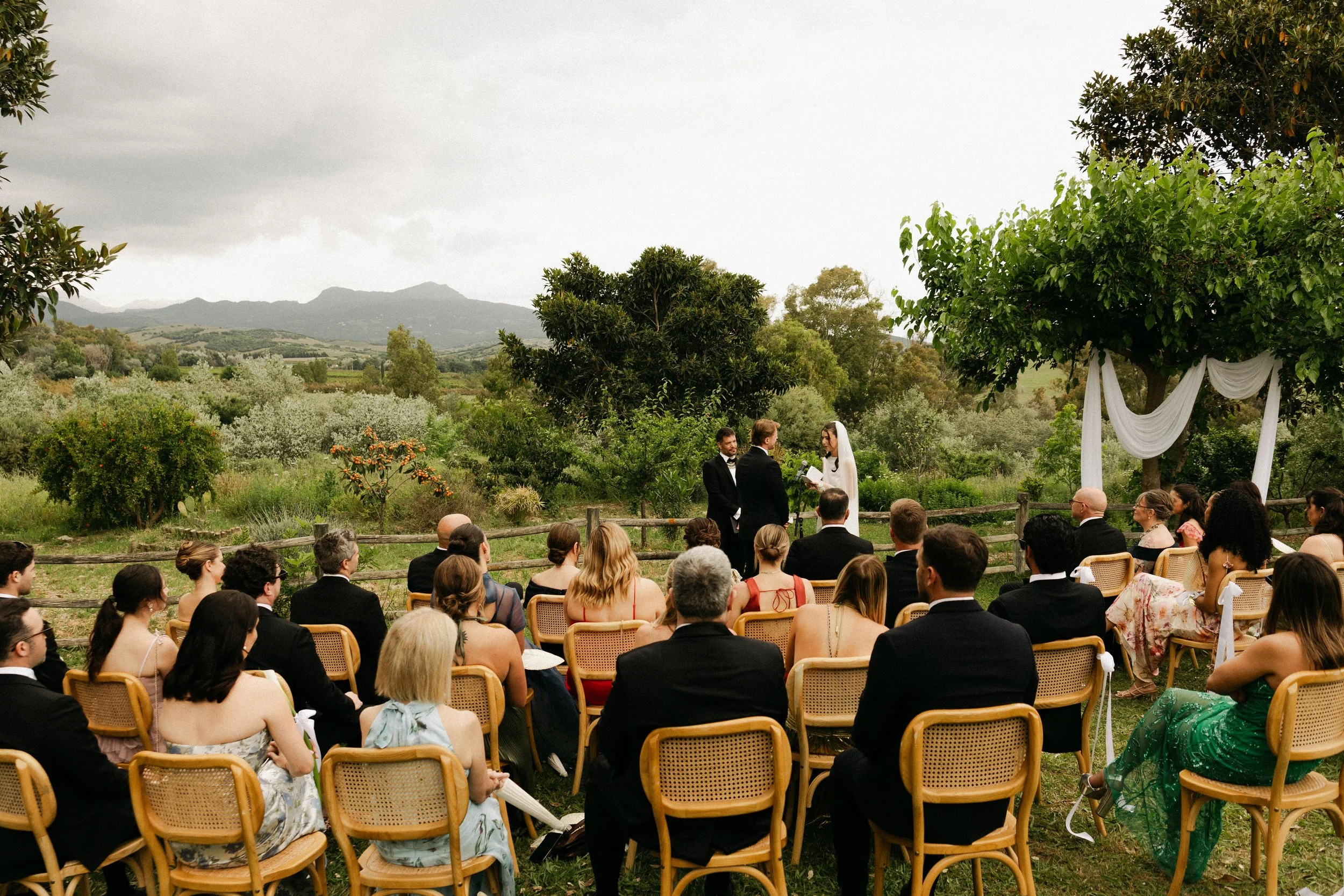 Couple exchanging vows during a destination wedding celebration in Finca la Gloria