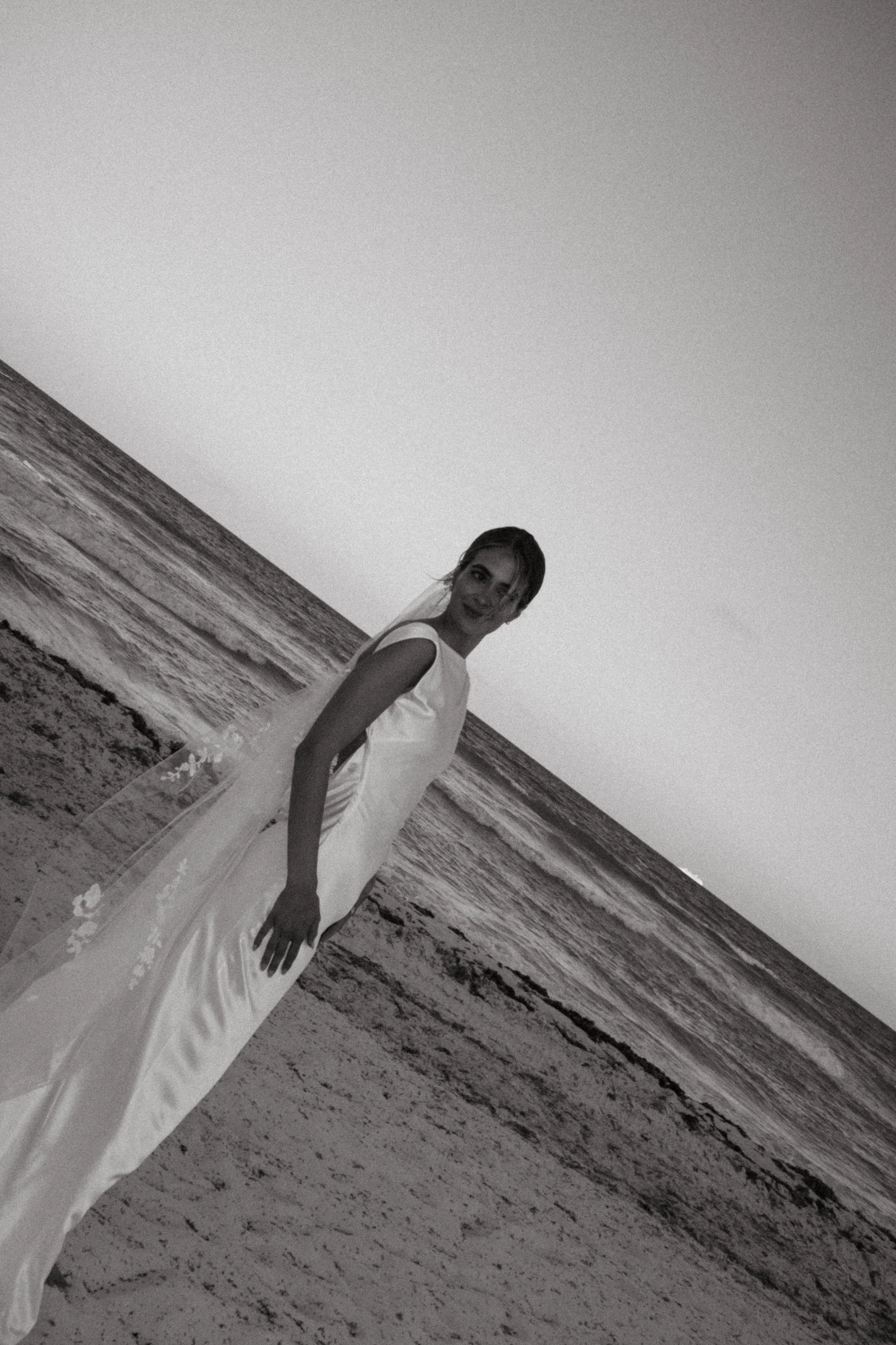 Beach wedding in Spain captured by Marbella wedding photographer on an empty beach