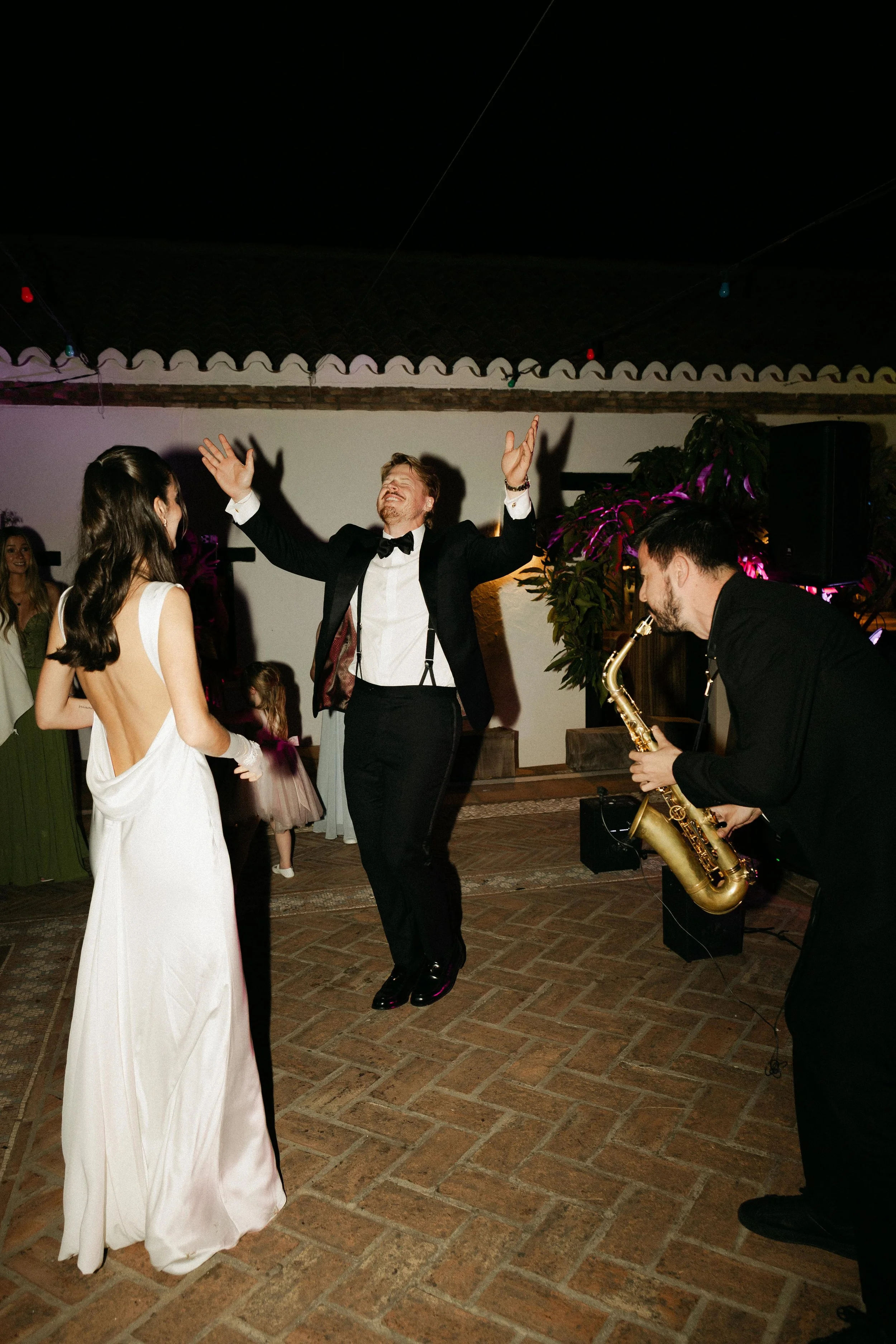 Documentary wedding photography capturing dance floor energy