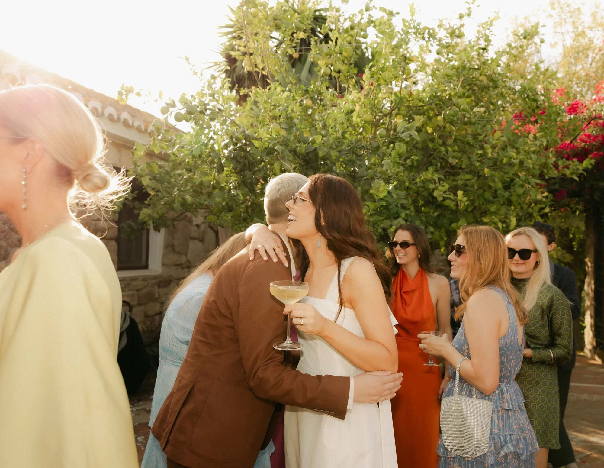 Intimate wedding cocktail hour in Spain with guests fully present and connected