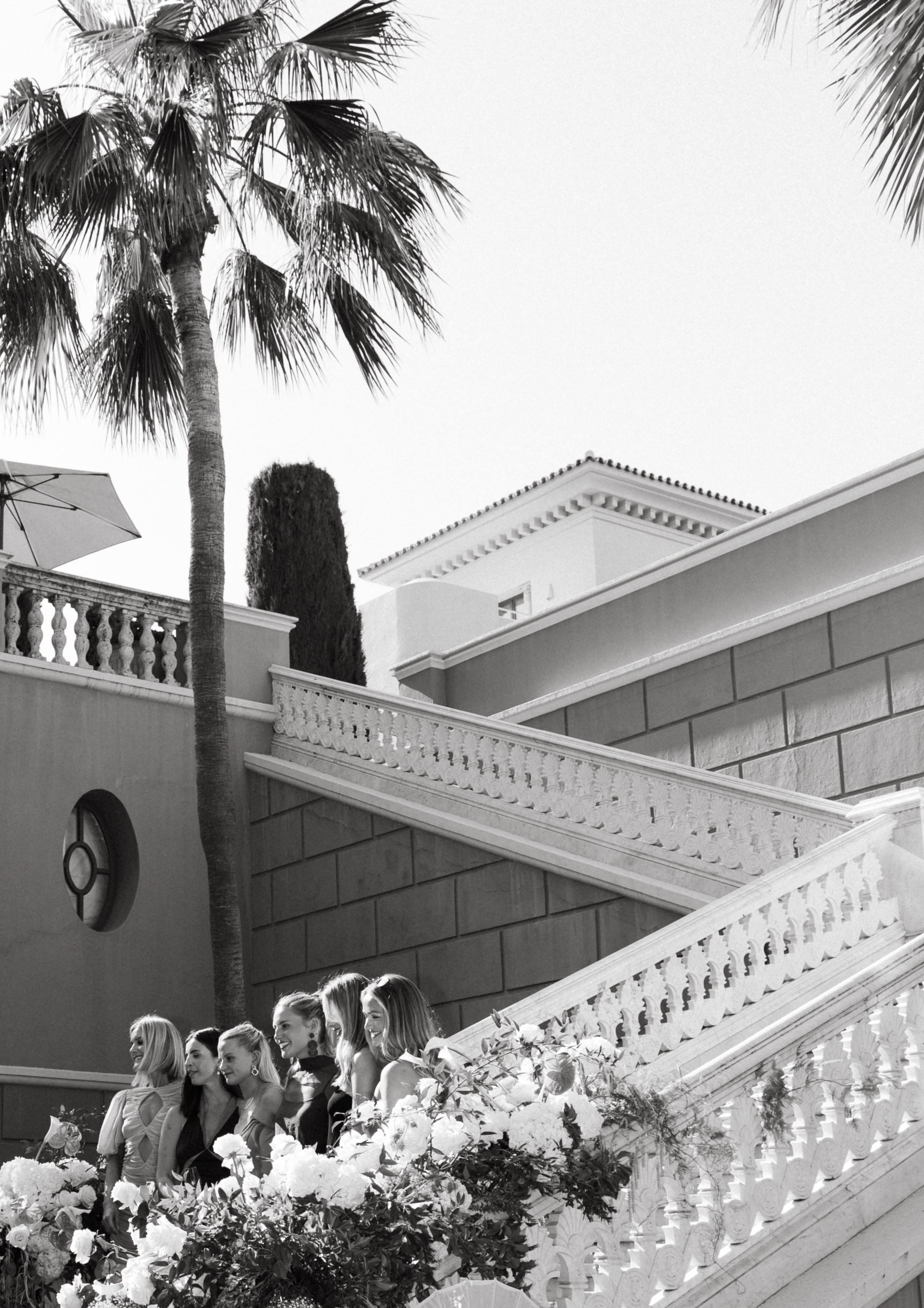 Guests mingling outdoor wedding cocktail Marbella Spain