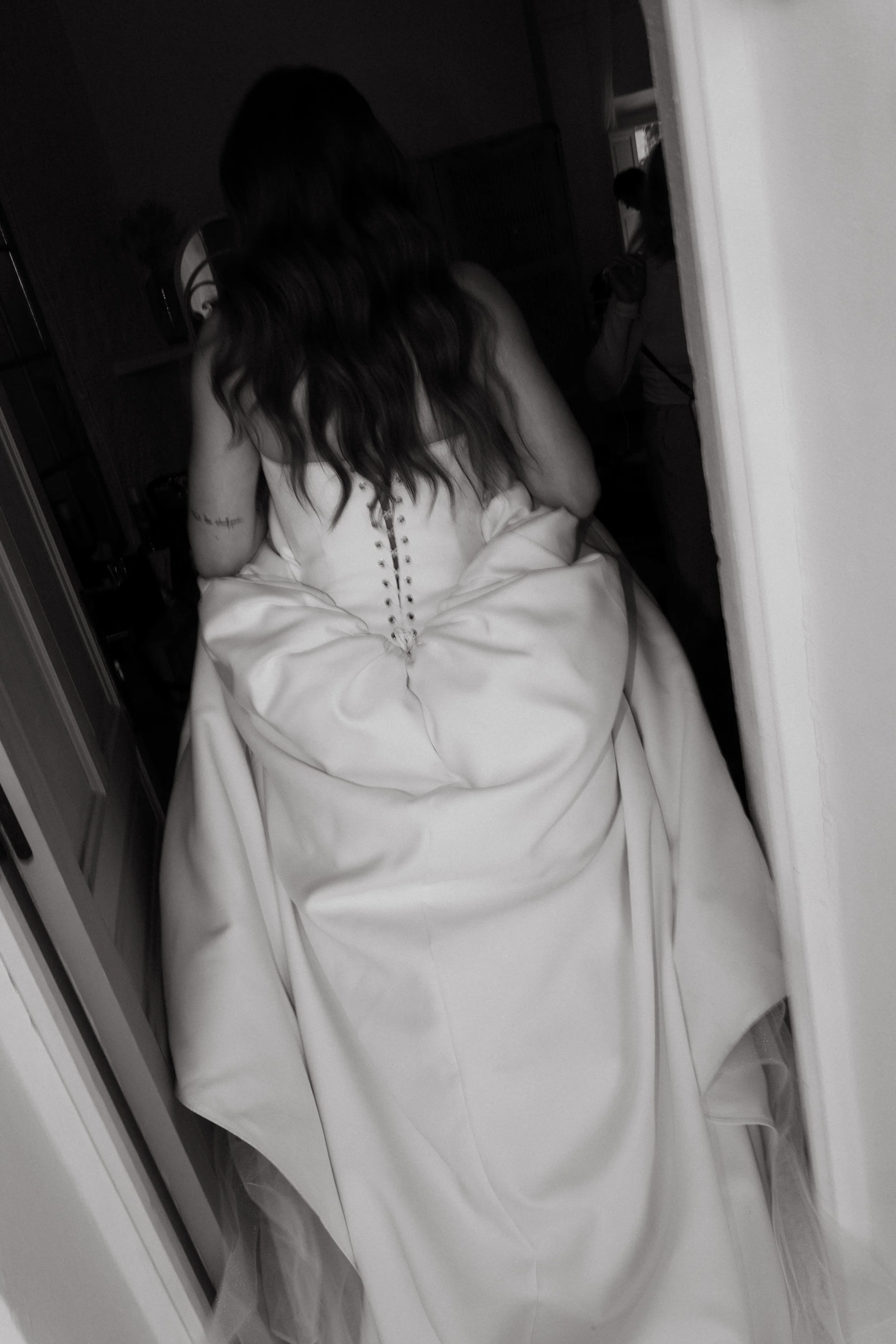 Editorial portrait of a bride in her wedding dress