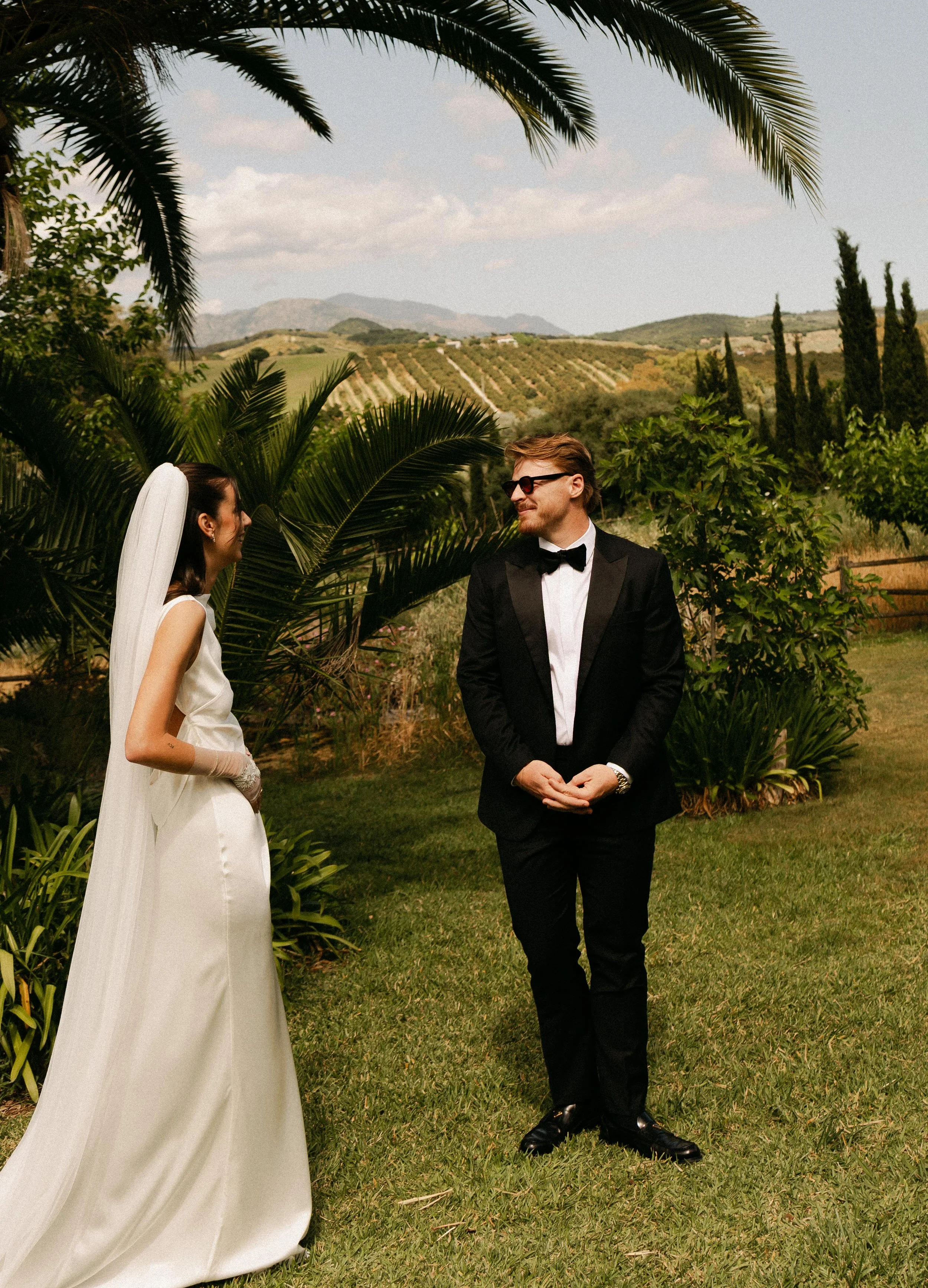 Emotional first look photographed by a Spain destination wedding photographer in Finca la Gloria