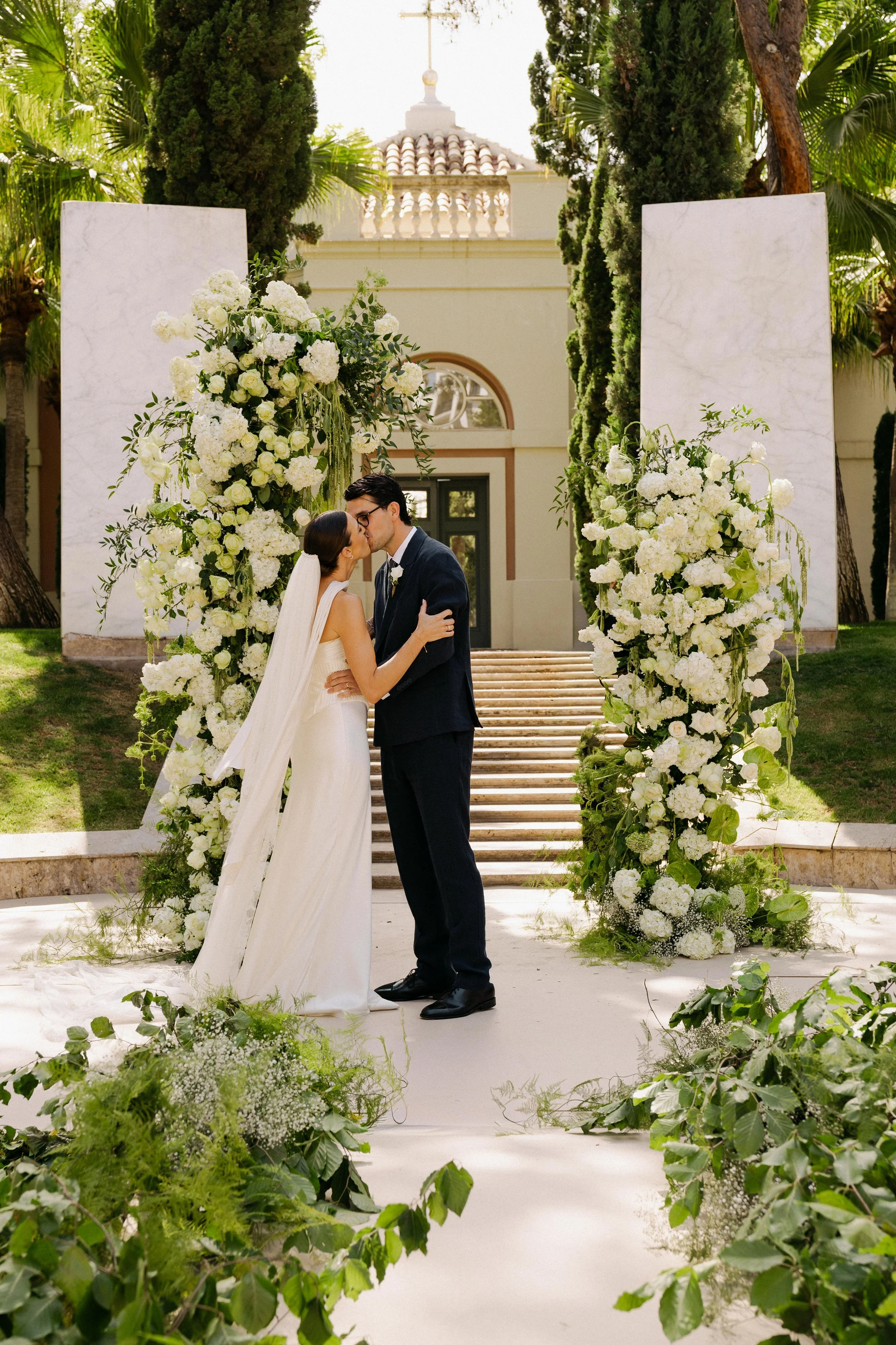 Outdoor wedding ceremony light Marbella Spain, first kiss in Villa Padierna Anantara