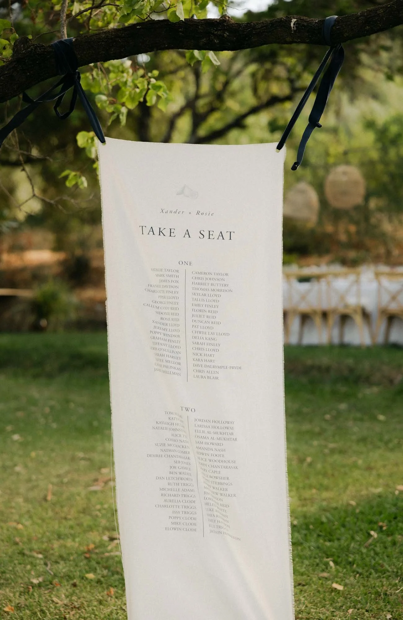 Outdoor wedding dinner in Andalusia with long tables warm light and relaxed atmosphere