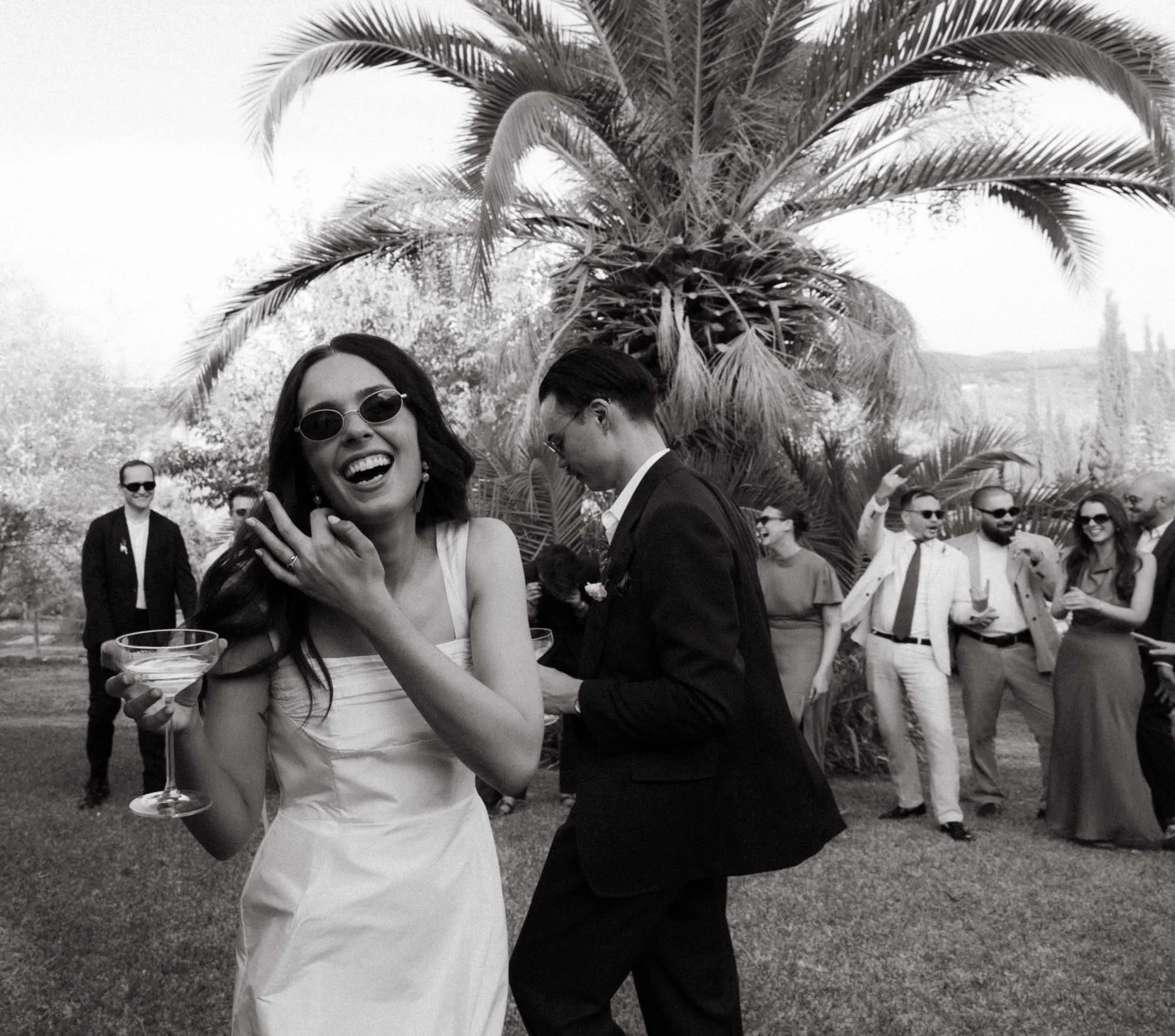 Intimate wedding cocktail hour in Spain with guests fully present and connected