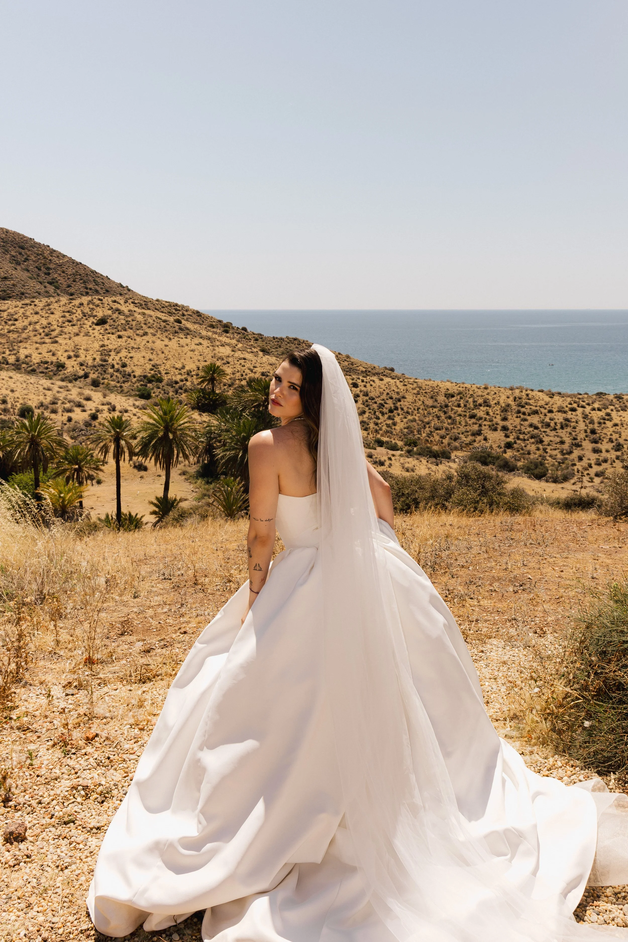 Fashion-forward wedding portraits in the Spanish landscape