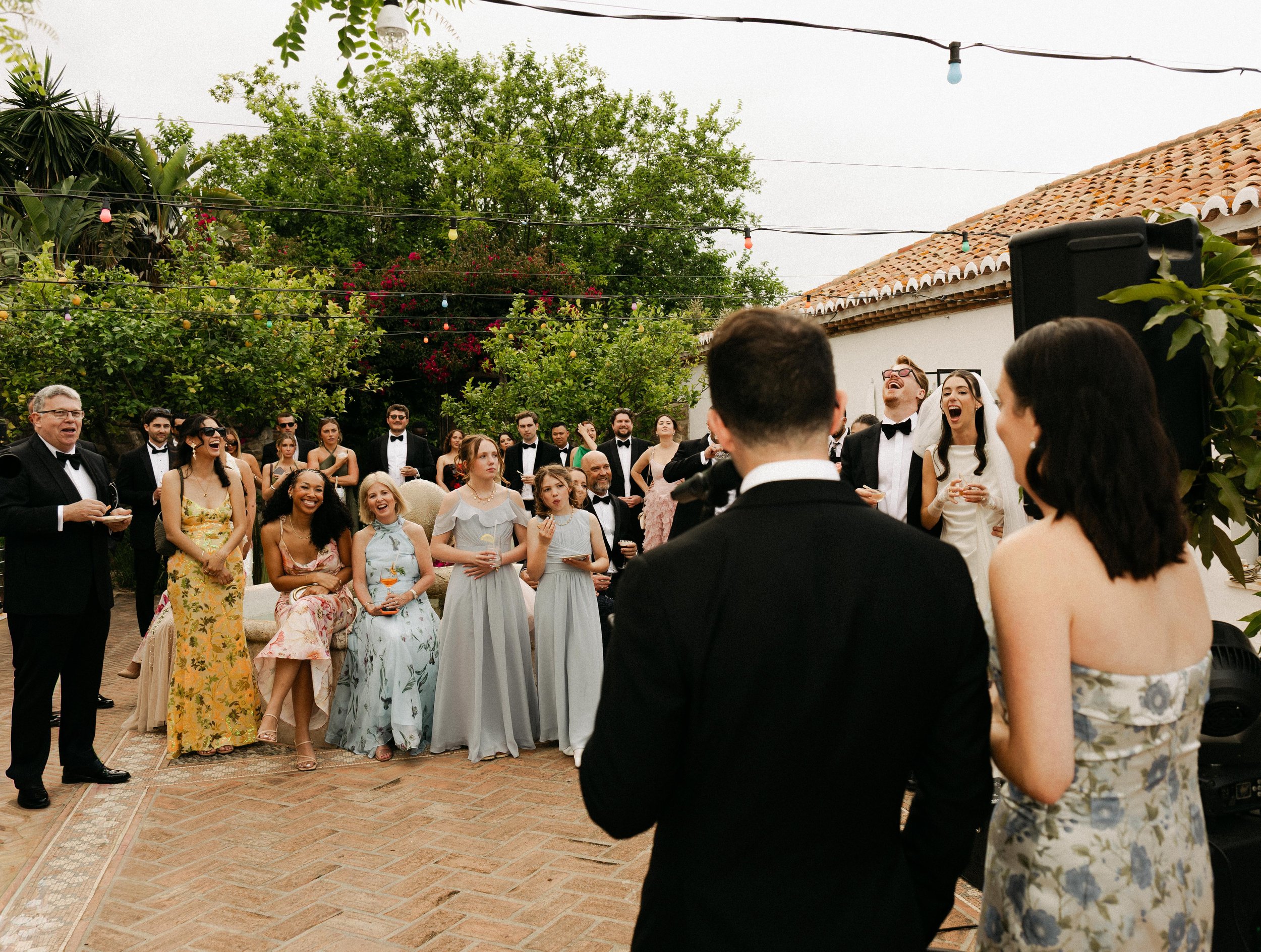 Documentary wedding photography capturing genuine speech reactions of the bride and groom