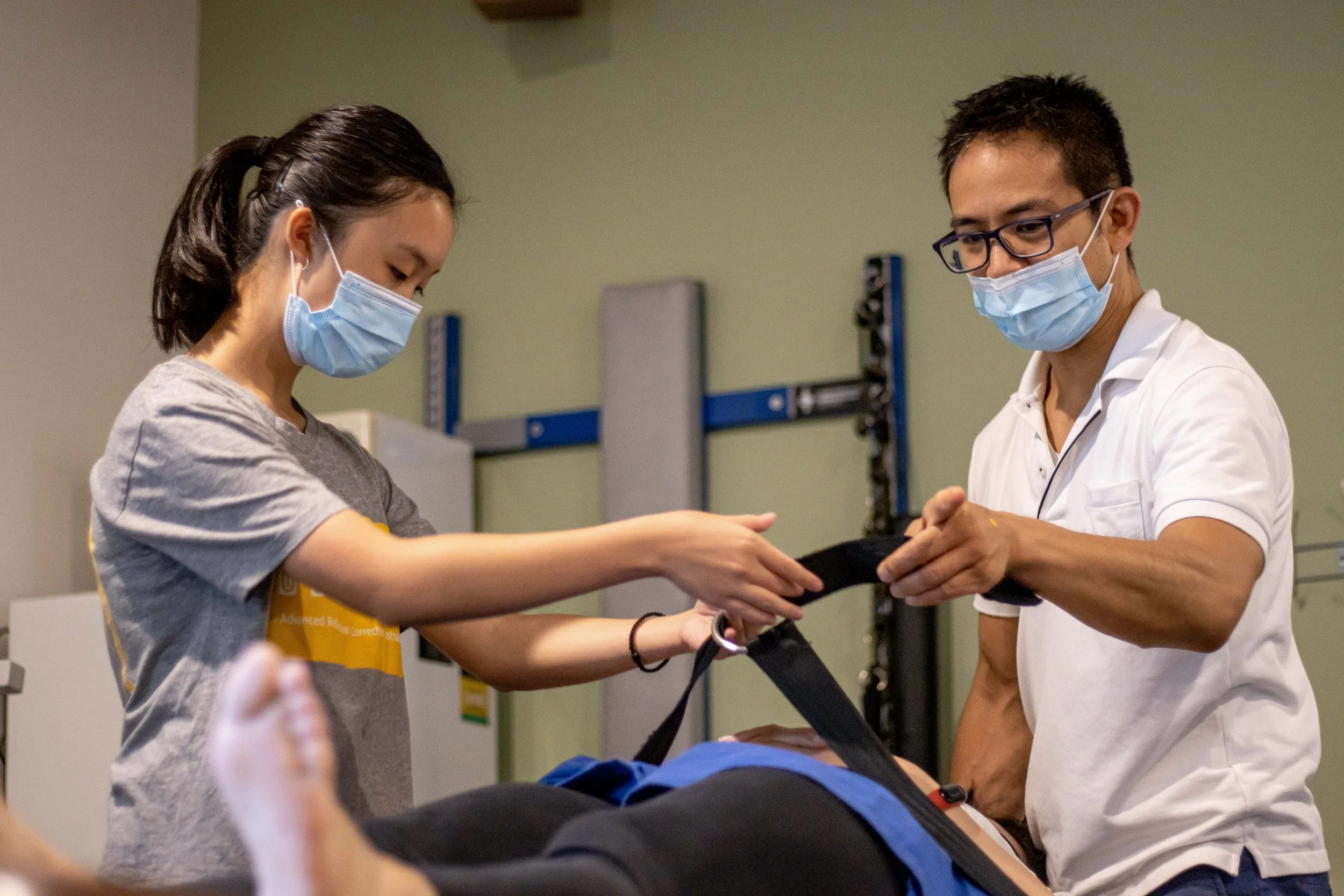 Gallery: Dr Lin and staff operating treatment equipment