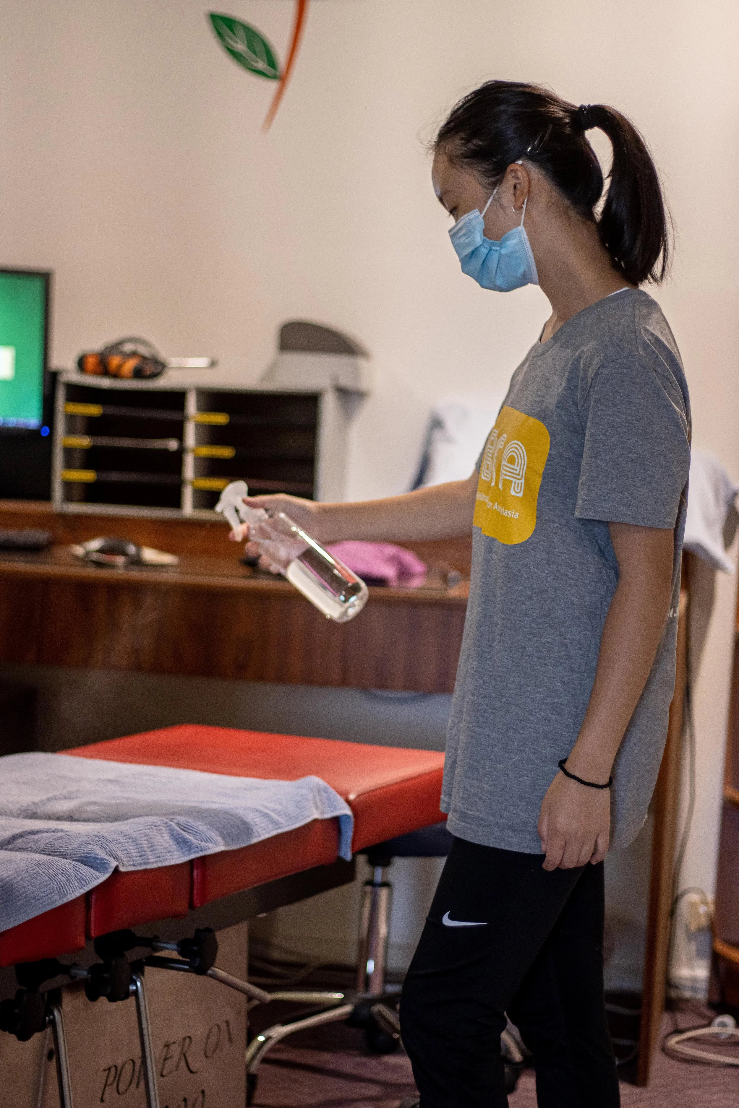Gallery: Staff member cleaning treatment equipment