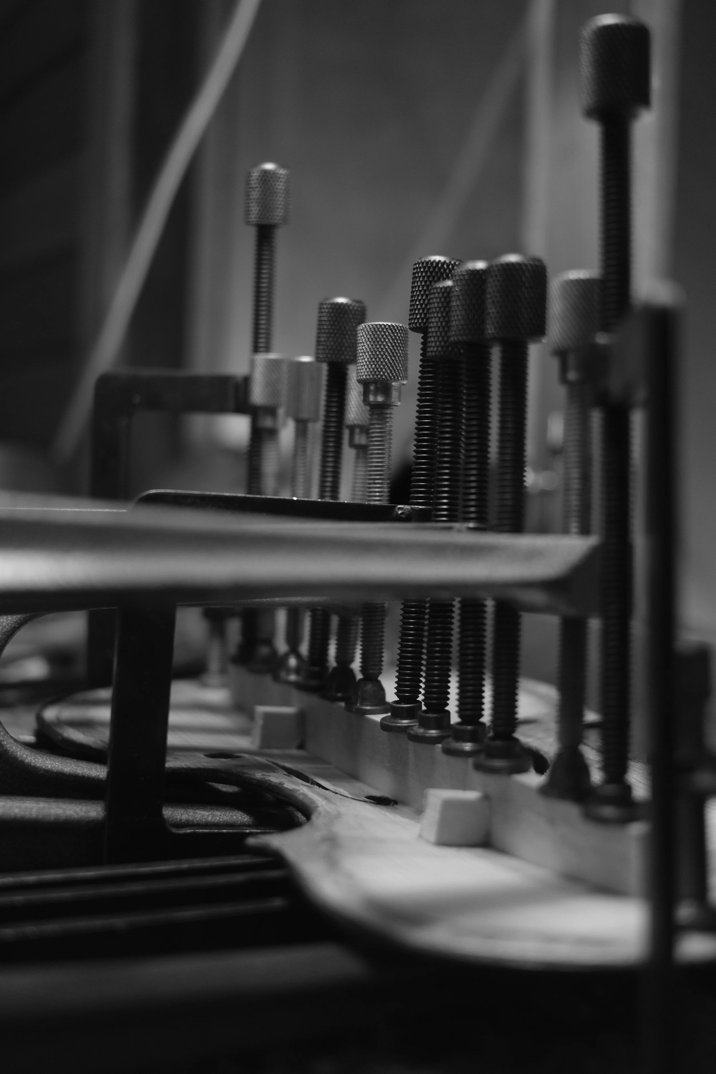 Gluing a new bass bar into a handcrafted violin. Sunshine Coast. Violin maker. 