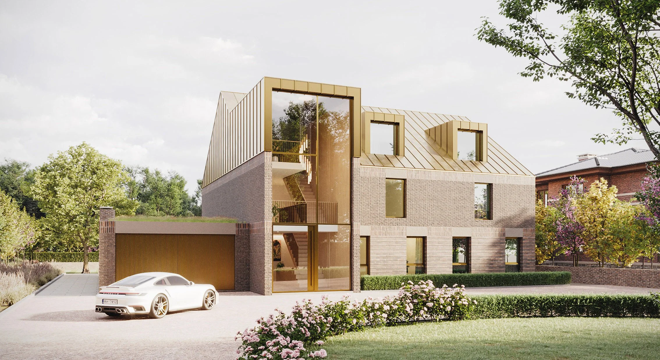 Bloc Architects — Modern two-story house with a gold-finished roof, large windows, surrounded by trees, and a white car in the driveway.