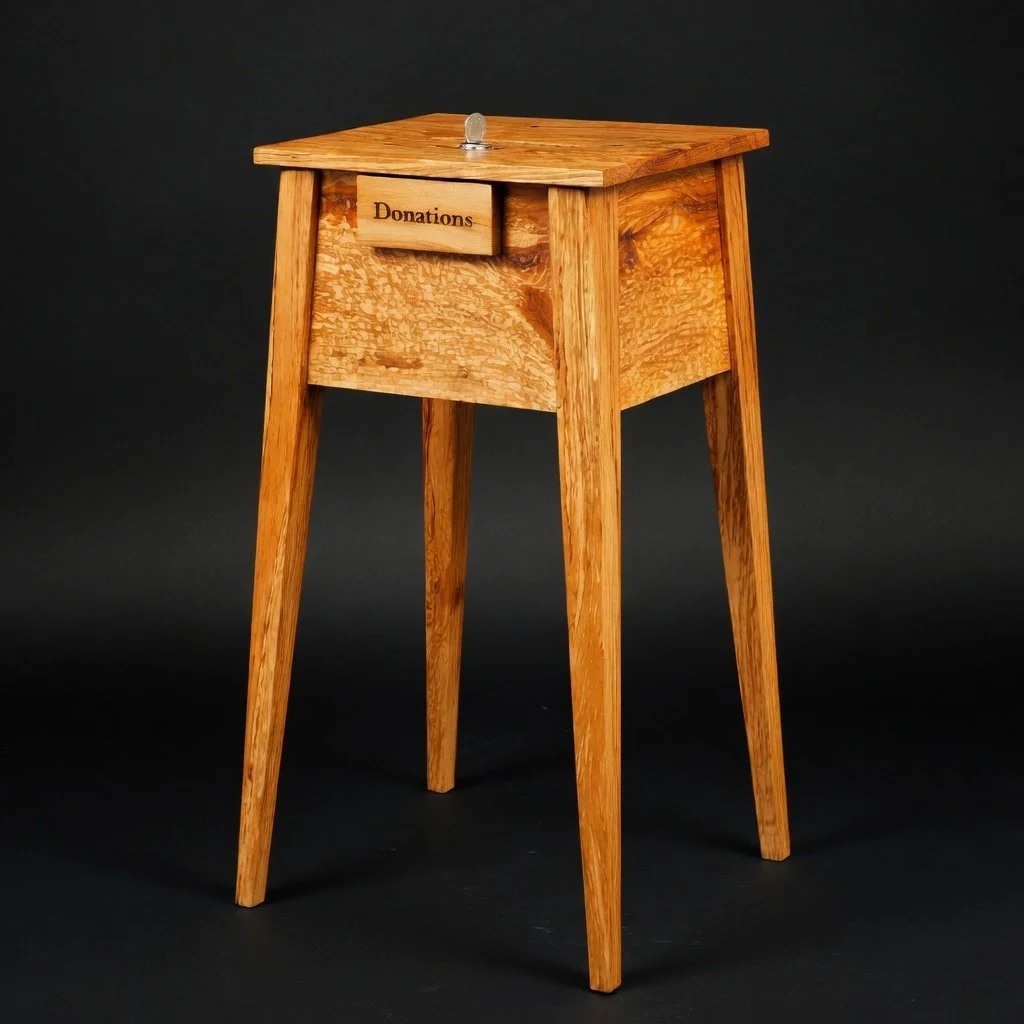 Flame figgurred beech donation box.
