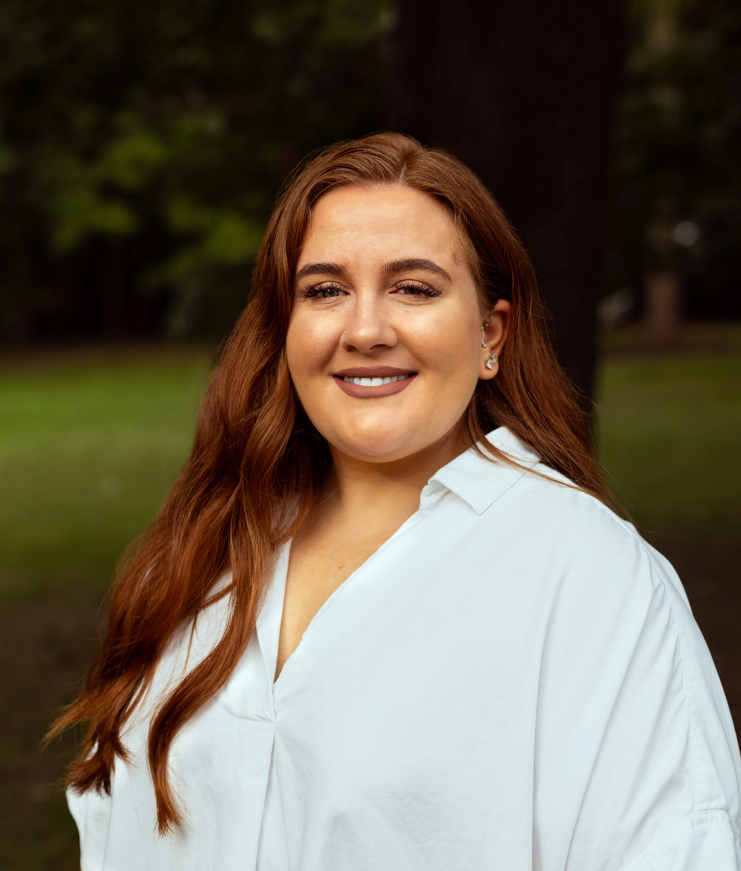 Corporate Headshots — Candid Caption