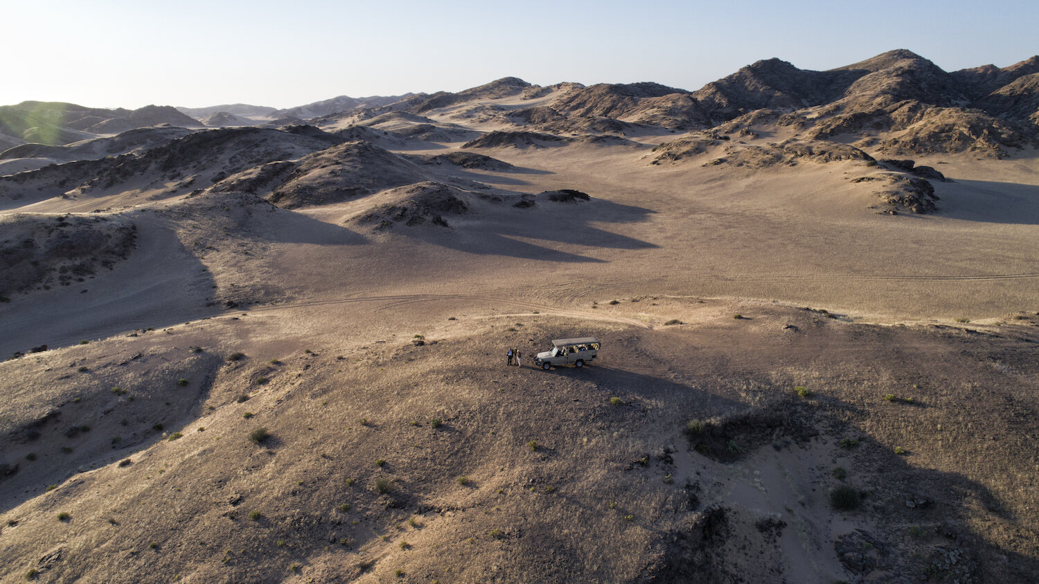 38Hoanib Valley Camp - Arial vehicle & dunes.jpg